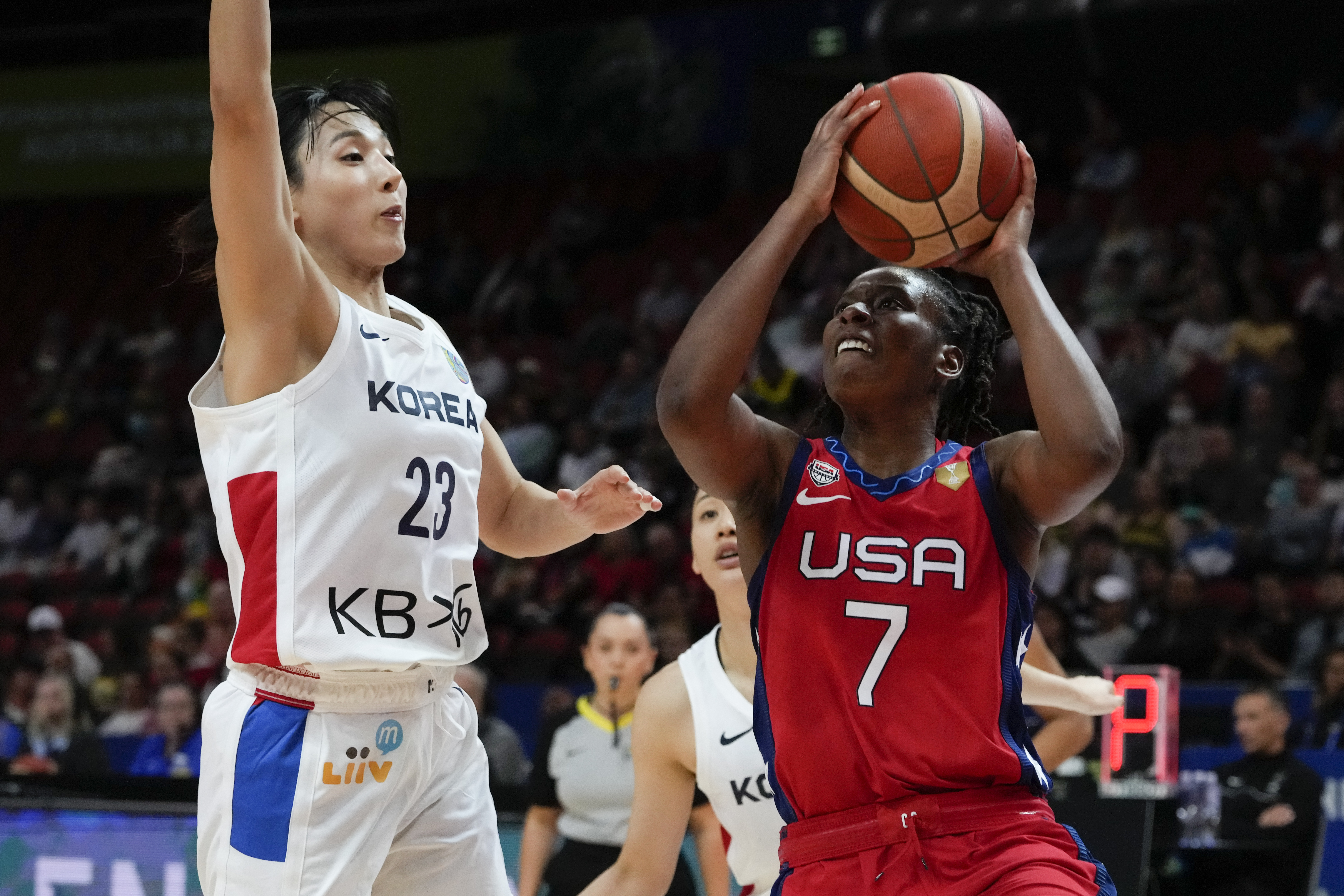 United States' Ariel Atkins shoots at goal as South Korea's Kim Danbi , left, attempts to block during their game at the women's Basketball World Cup in Sydney, Australia, Monday, Sept. 26, 2022. 