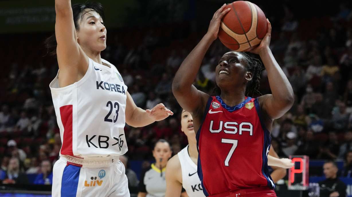 United States' Ariel Atkins shoots at goal as South Korea's Kim Danbi , left, attempts to block during their game at the women's Basketball World Cup in Sydney, Australia, Monday, Sept. 26, 2022.