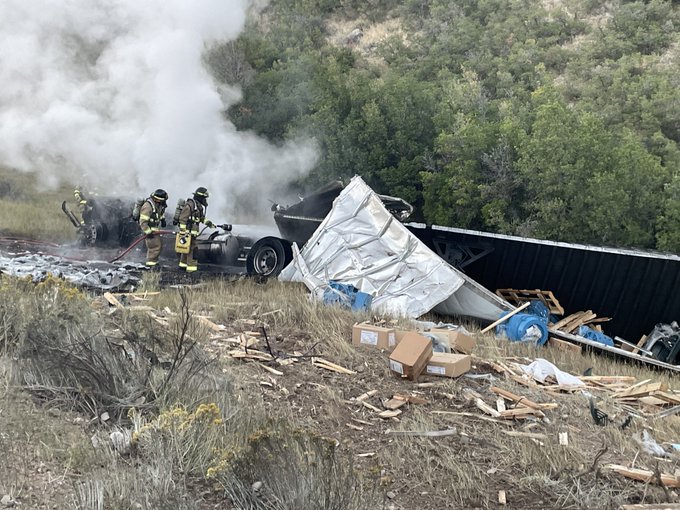 Crews respond to a semitruck fire after the driver was killed early Monday during a crash in Utah County.