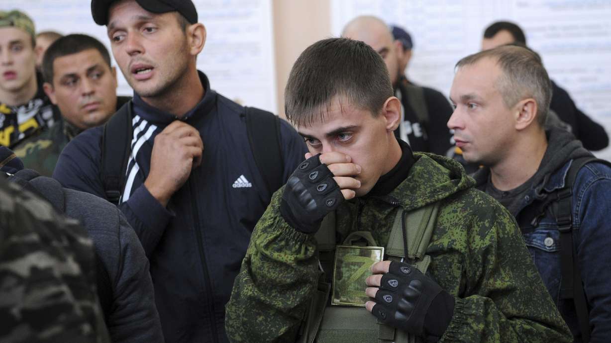 Russian recruits gather inside a military recruitment center of Bataysk, Rostov-on-Don region, south of Russia, Monday. Russian President Vladimir Putin last Wednesday ordered a partial mobilization of reservists to beef up his forces in Ukraine.