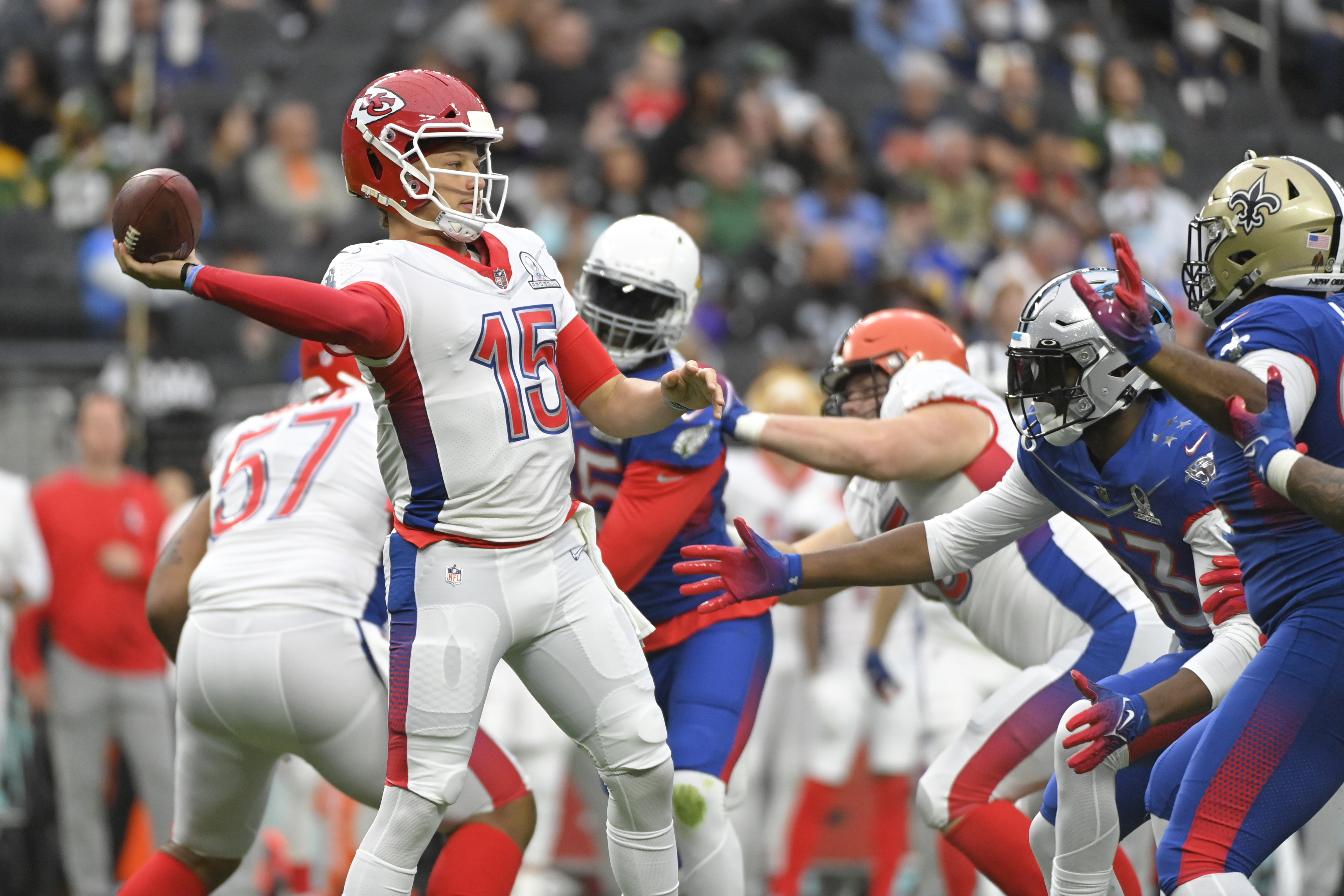 FILE - AFC quarterback Patrick Mahomes (15), of the Kansas City Chiefs passes against the NFC during the first half of the Pro Bowl NFL football game, Sunday, Feb. 6, 2022, in Las Vegas. The NFL is replacing the Pro Bowl with weeklong skills competitions and a flag football game. The new event will be renamed “The Pro Bowl Games” and will feature AFC and NFC players showcasing their football and non-football skills in challenges over several days.
