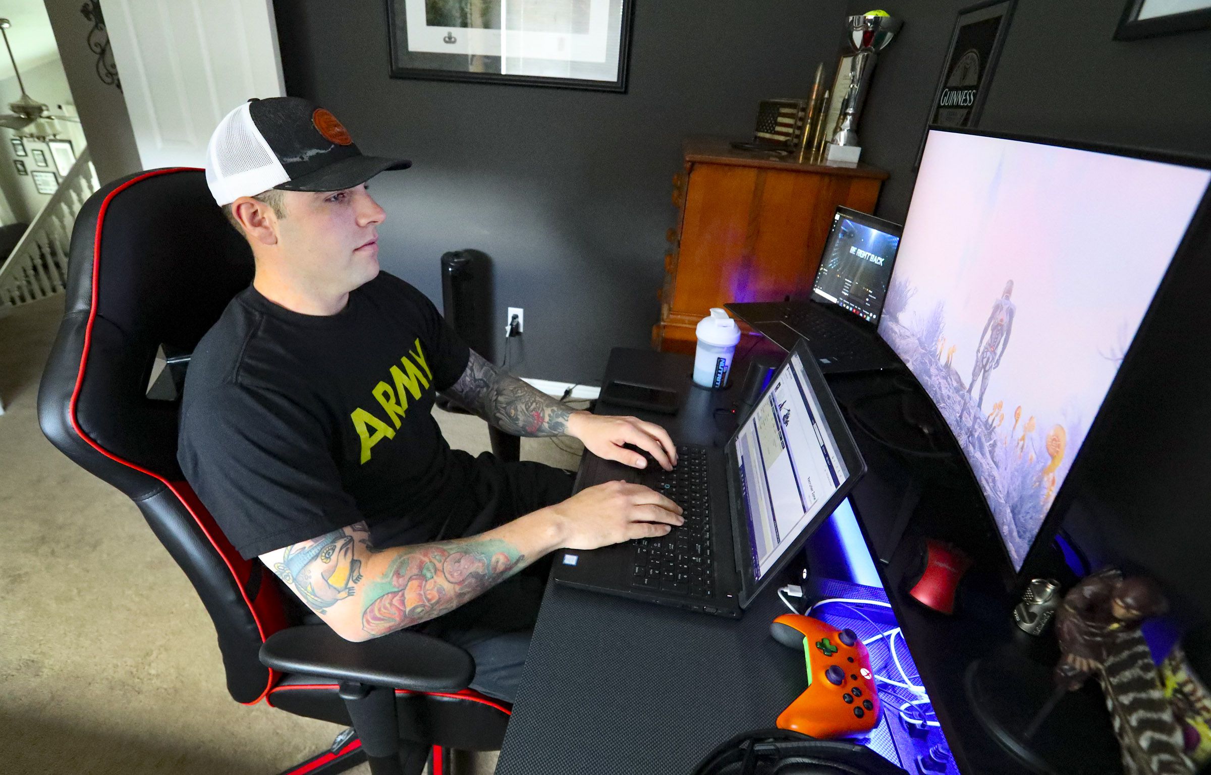 U.S. Army recruiter Staff Sgt. Garret Richard works on his laptop from his home in Pleasant Grove on April 23, 2020. The sudden shift to remote work amid COVID-19 drove more than half of overall U.S. housing price growth during the pandemic, according to new research.