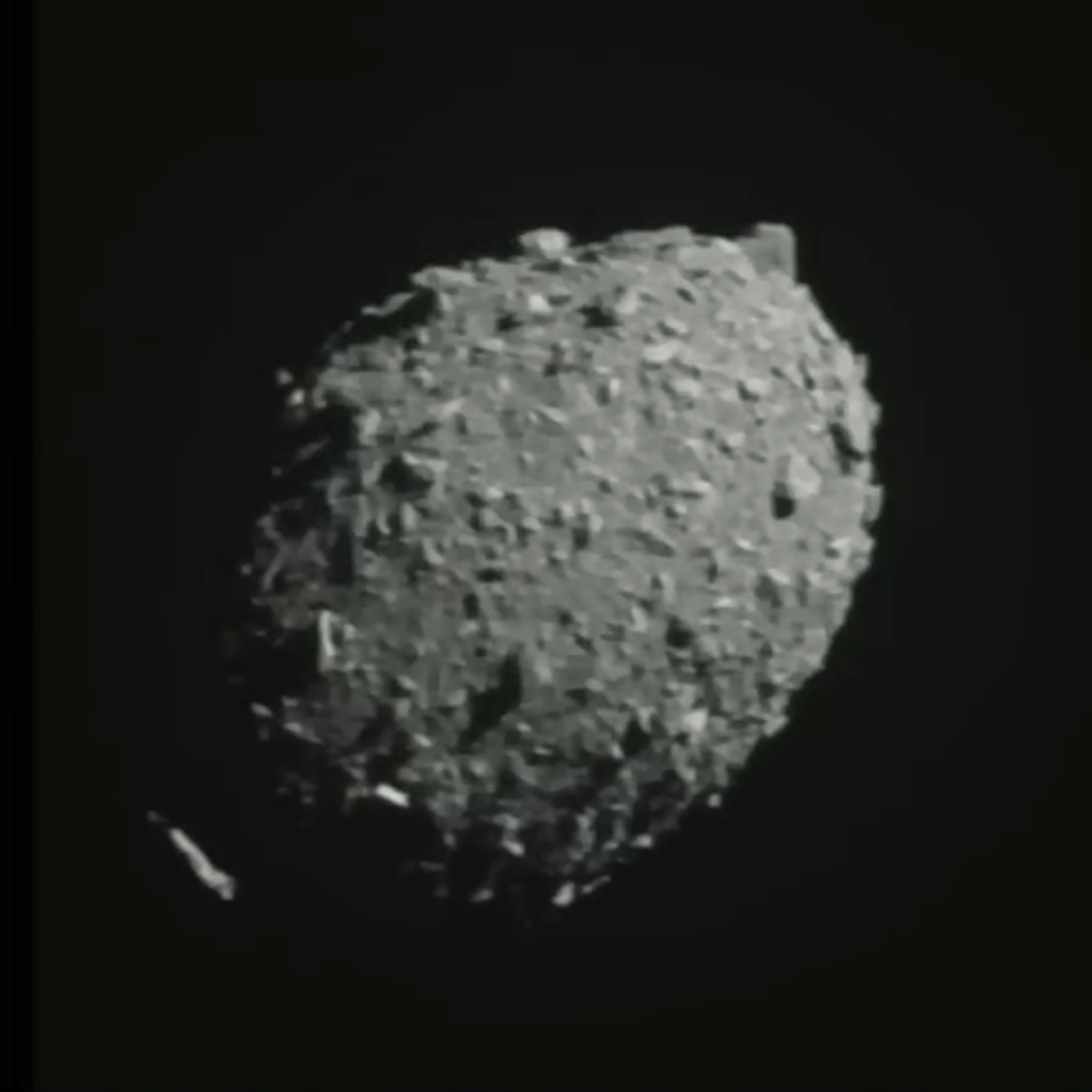 In this image made from a NASA livestream and taken from the Double Asteroid Redirection Test spacecraft, asteroid Dimorphos is seen as the spacecraft flies toward it, Monday.