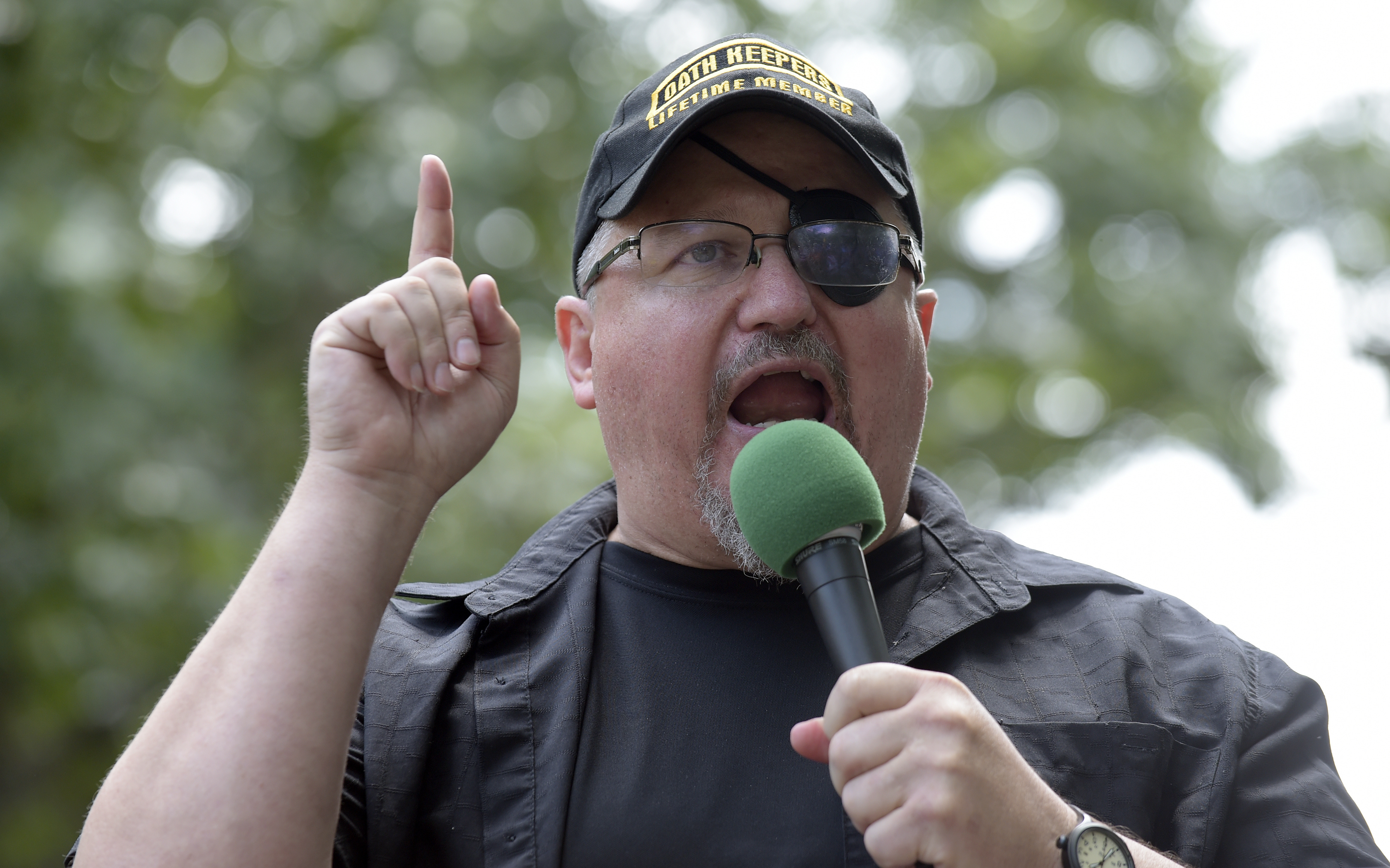 Stewart Rhodes, founder of the Oath Keepers, speaks during a rally outside the White House in Washington, June 25, 2017. Jury selection began Tuesday in the trial of Rhodes and four associates charged with seditious conspiracy.