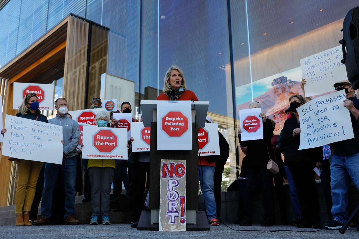 Sarah Buck, a member of Stop the Polluting Port Coalition, speaks during a press conference outside of the offices of the Utah Inland Port Authority in Salt Lake City on Monday, Sept. 20, 2021. The group recently commissioned a study of the port that they say the Utah Inland Port Authority had failed to do.