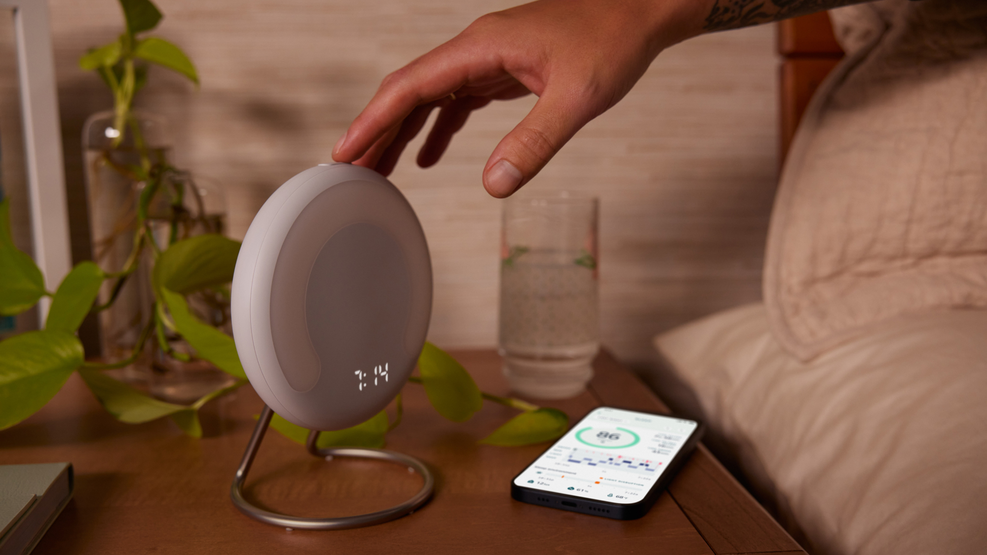 This image provided by Amazon shows the Halo Rise bedside smart alarm. The e-commerce and tech giant said Wednesday, that it will start selling the device later this year. Halo Rise will be able to track sleeping patterns without a wristband by using no-contact sensors and artificial intelligence to measure a user’s movement and breathing patterns, according to Amazon.