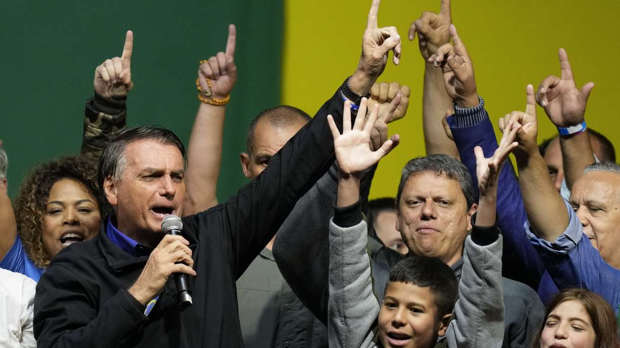 Brazilian President Jair Bolsonaro, who is running for a second term, speaks during a campaign rally in Santos, Brazil, Wednesday, Sept. 28, 2022. Brazil's general elections are scheduled for Oct. 2.