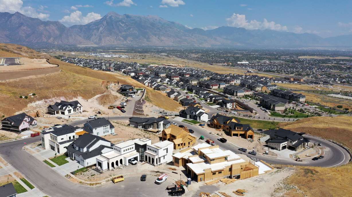 Single-family homes under construction in the Lakeview Estates community in Lehi are pictured on July 19. As the U.S. standard 30-year fixed mortgage rate has blown past 6% and now flirts with 7%, it's chipping more and more away at what a would-be homebuyer might actually be able to afford.