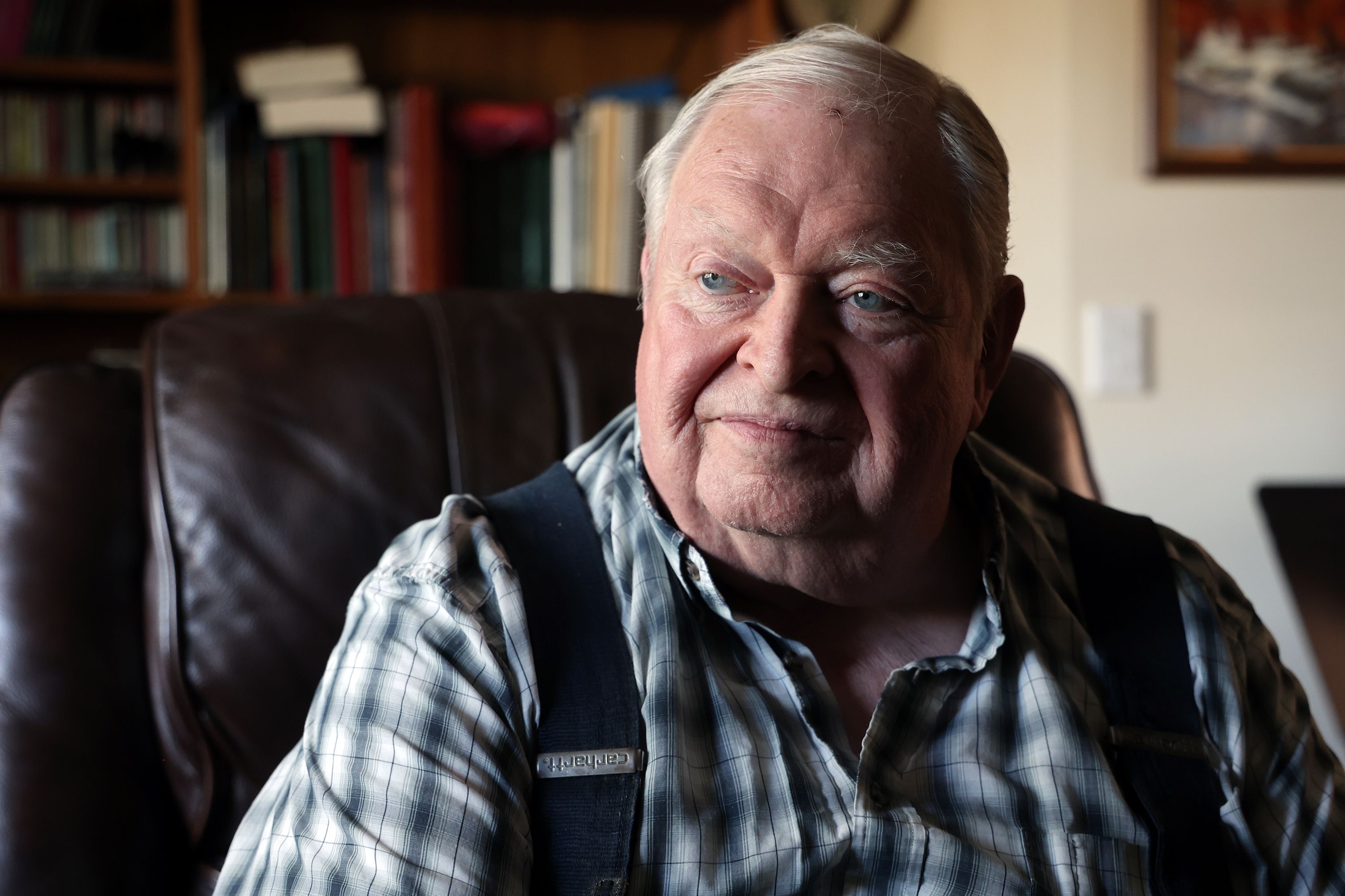 Ronald Whitaker, an 80-year-old retired medical technologist, poses for photos at his home in Taylorsville on Tuesday.