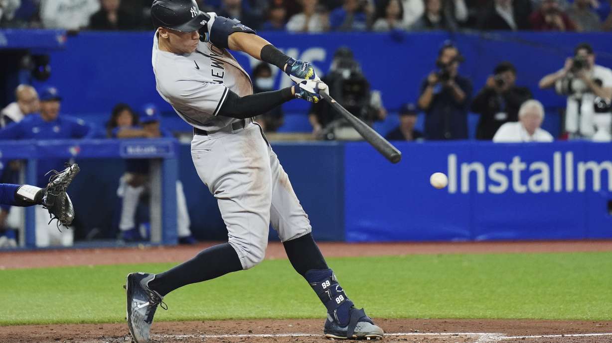 New York Yankees' Aaron Judge grounds out against the Toronto Blue Jays during the fourth inning of a baseball game Wednesday, Sept. 28, 2022, in Toronto.