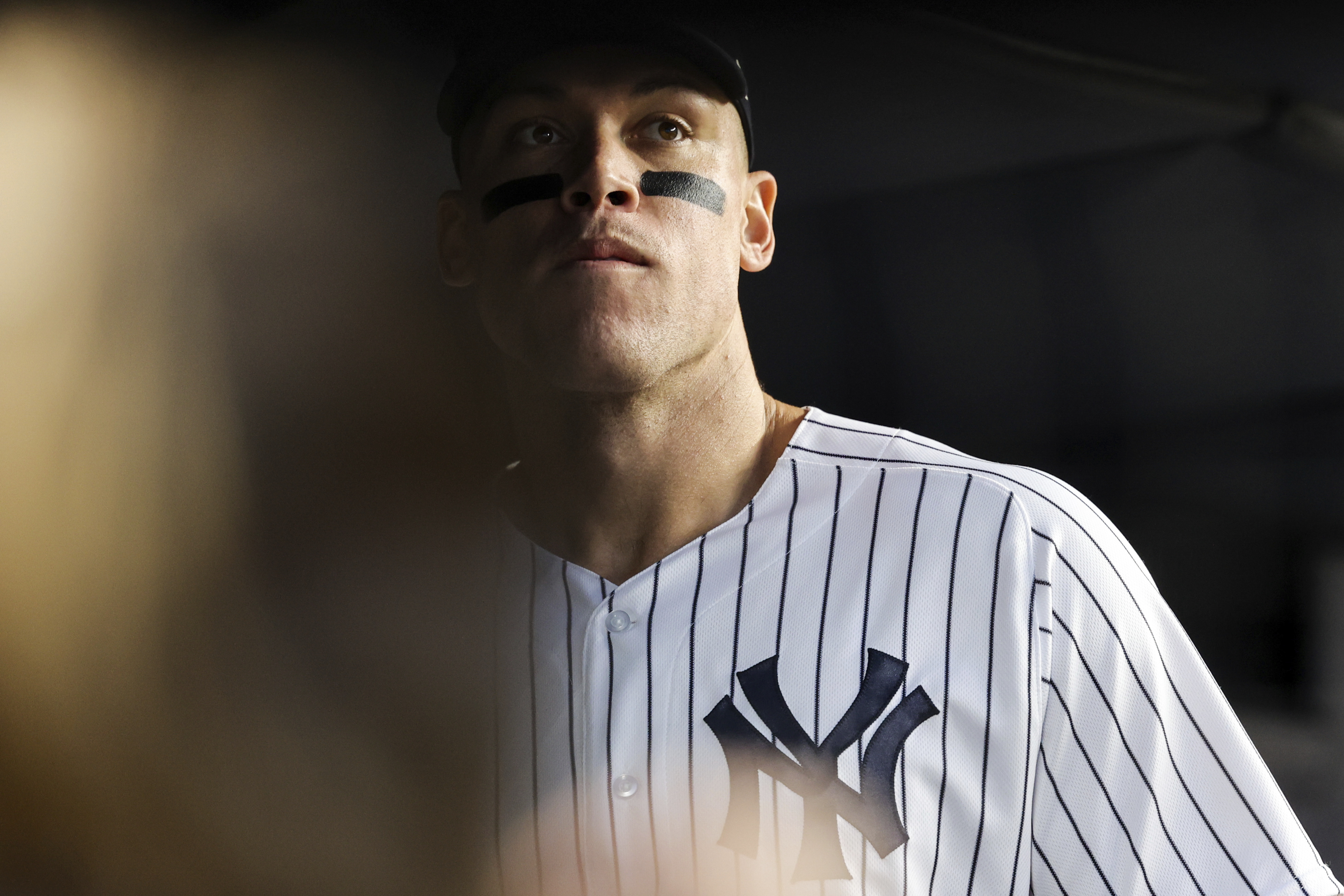 New York Yankees' Aaron Judge looks out before a baseball game against the Boston Red Sox Sunday, Sept. 25, 2022, in New York. 