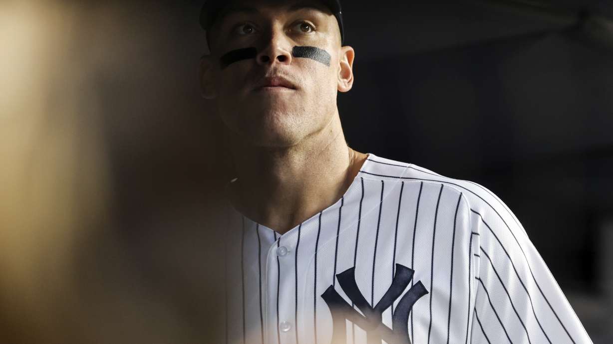 New York Yankees' Aaron Judge looks out before a baseball game against the Boston Red Sox Sunday, Sept. 25, 2022, in New York.