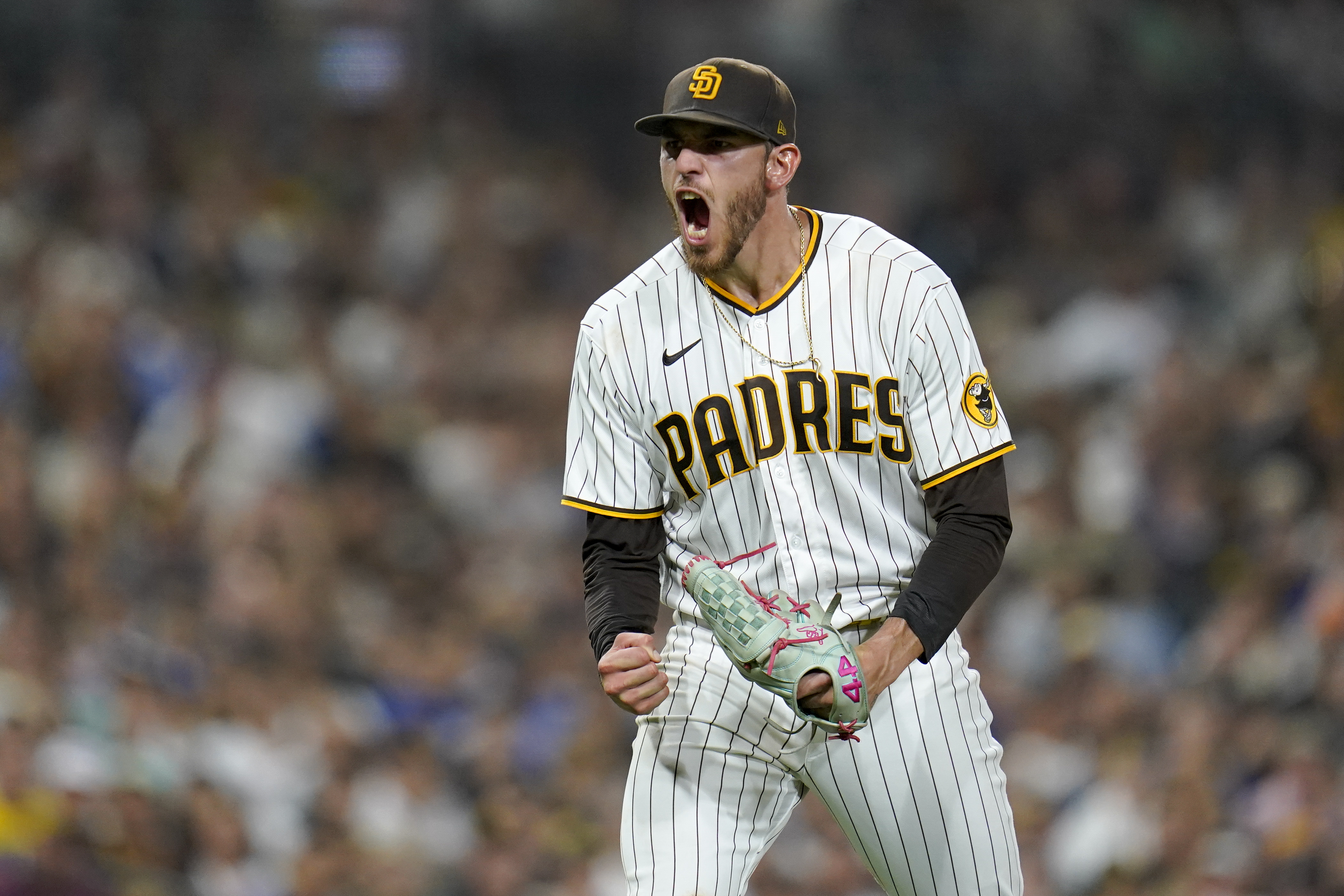 San Diego Padres starting pitcher Joe Musgrove reacts after getting the third out with the bases loaded during the fifth inning of the team's baseball game against the Los Angeles Dodgers, Wednesday, Sept. 28, 2022, in San Diego. 