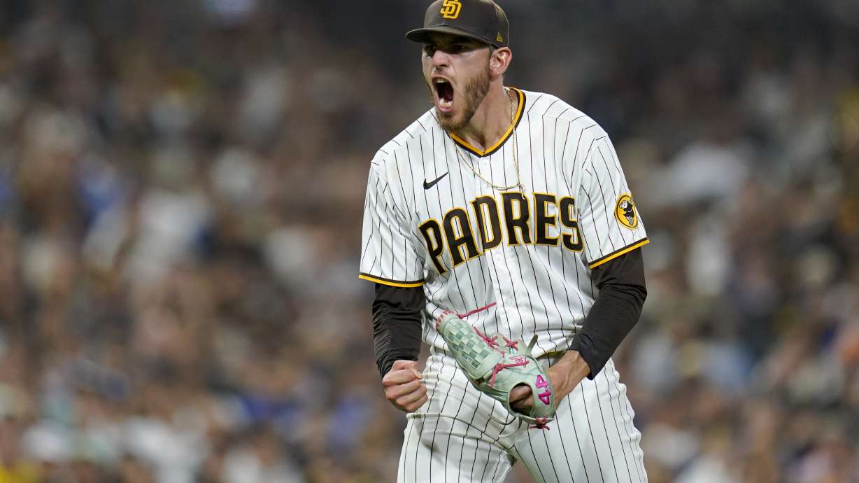 San Diego Padres starting pitcher Joe Musgrove reacts after getting the third out with the bases loaded during the fifth inning of the team's baseball game against the Los Angeles Dodgers, Wednesday, Sept. 28, 2022, in San Diego.
