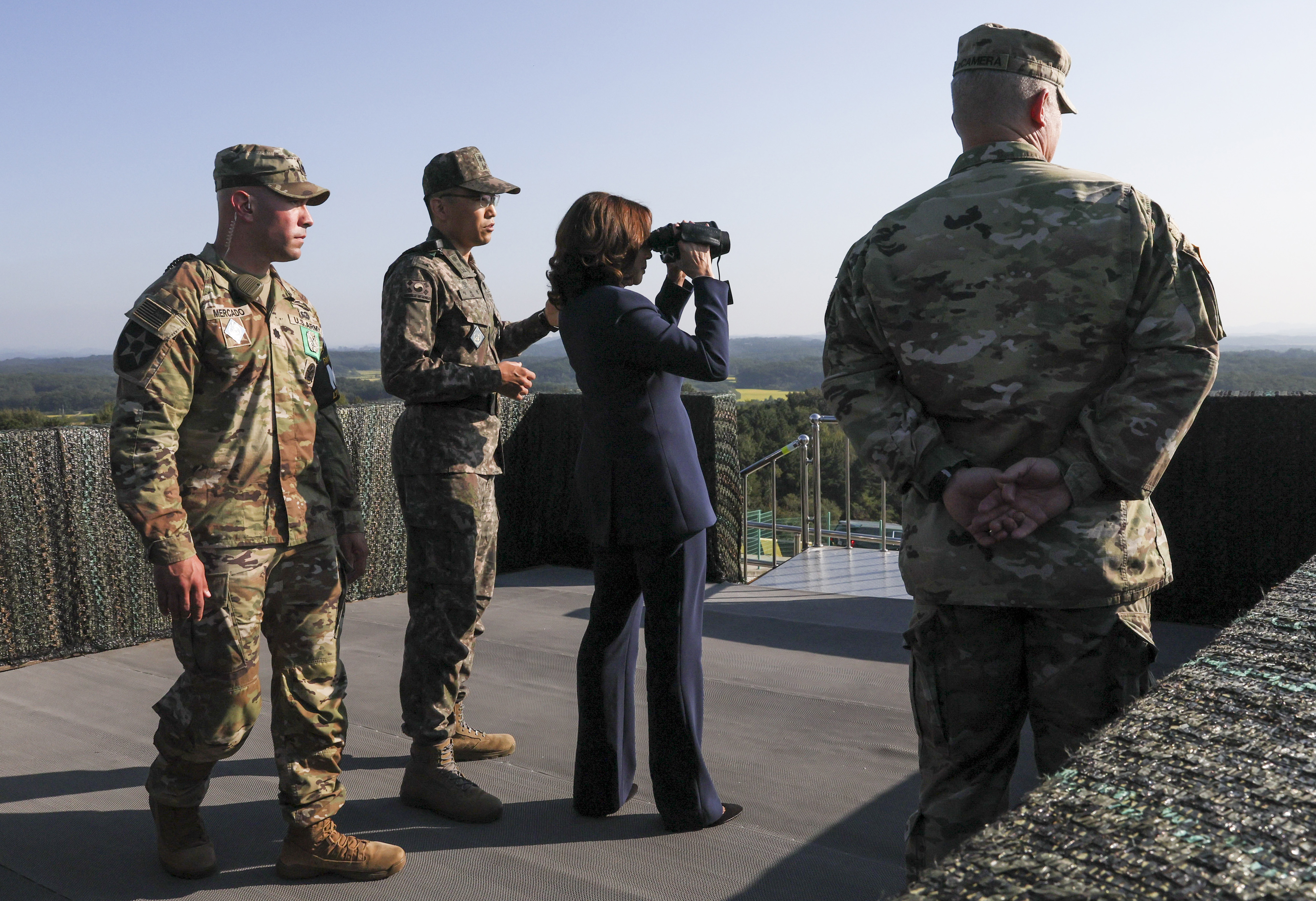 U.S. Vice President Kamala Harris stands at a military observation post as she visits the demilitarized zone separating the two Koreas, in Panmunjom, South Korea, Thursday.