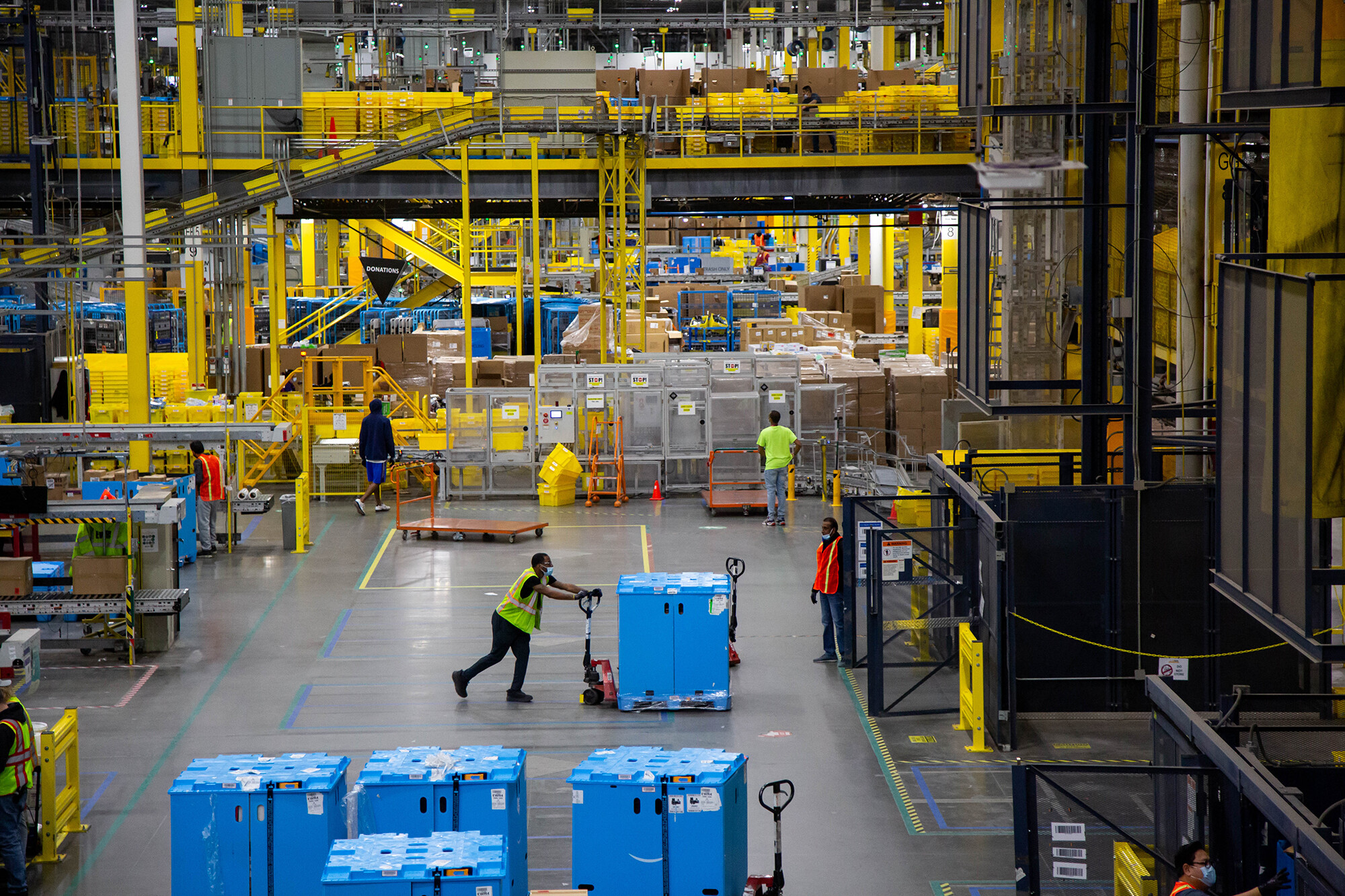 Amazon on Wednesday said it is raising the average starting pay for its warehouse workers and delivery drivers to more than $19 an hour, up from $18 previously, at a time when union pushes continue to spread across several of its facilities.