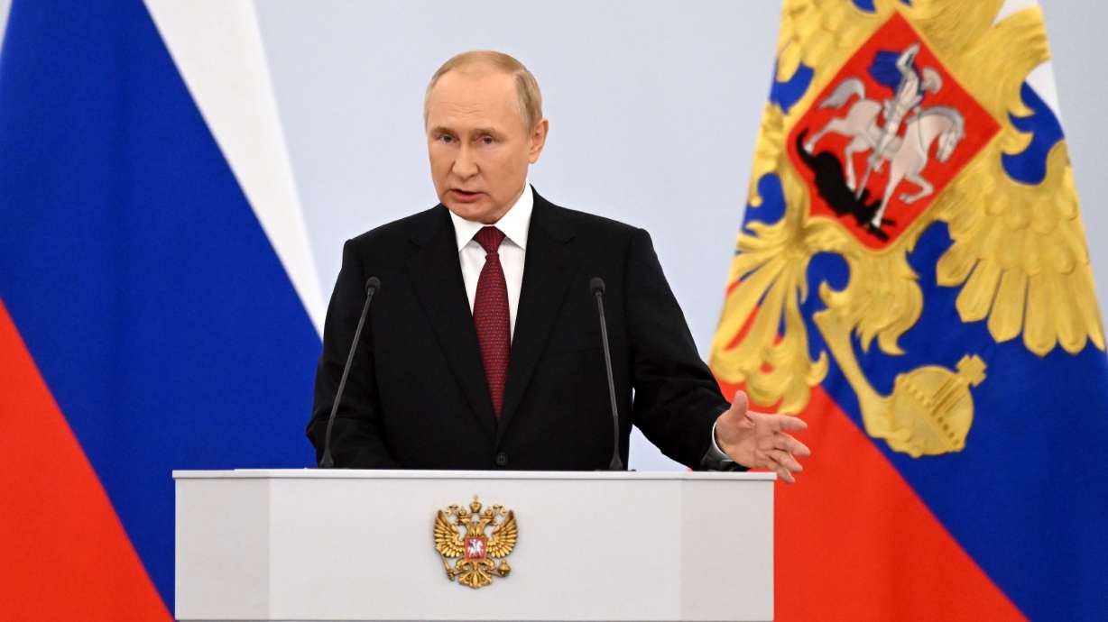 Russian President Vladimir Putin speaks during celebrations marking the incorporation of regions of Ukraine to join Russia, in Red Square in Moscow, Russia, Friday. The U.S. then sanctioned more than 1,000 people and firms connected to Russia's invasion of Ukraine.