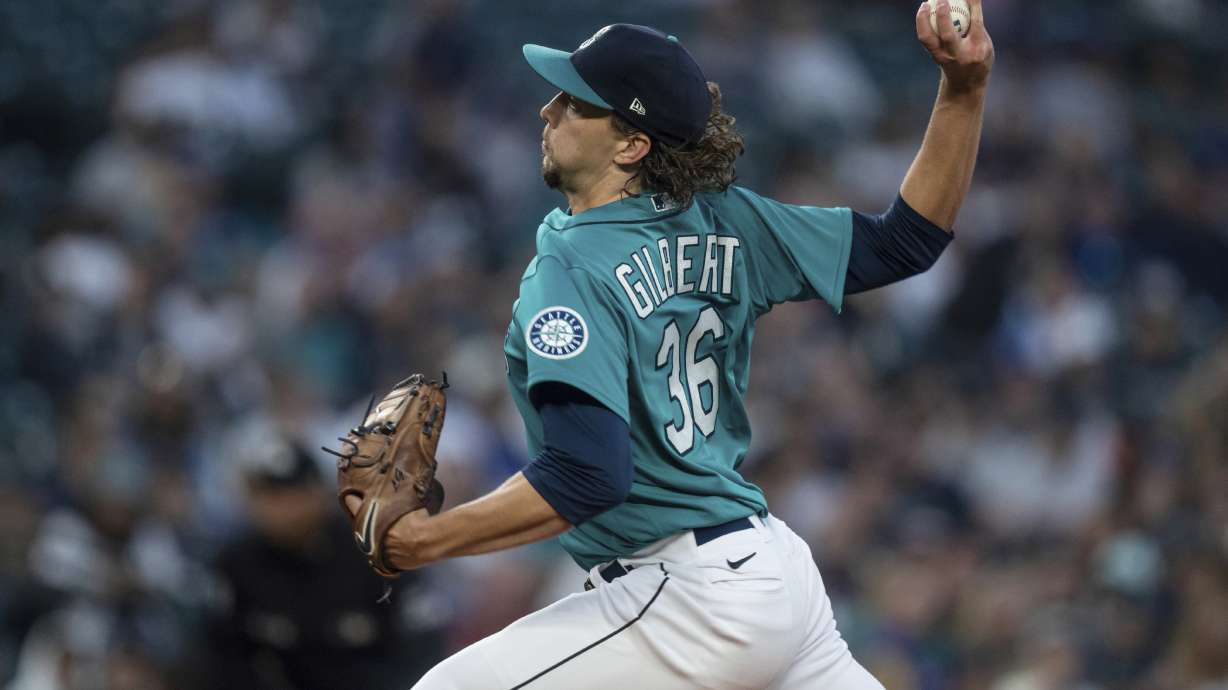 Seattle Mariners starter Logan Gilbert delivers a pitch during the first inning of the team's baseball game against the Oakland Athletics, Friday, Sept. 30, 2022, in Seattle.
