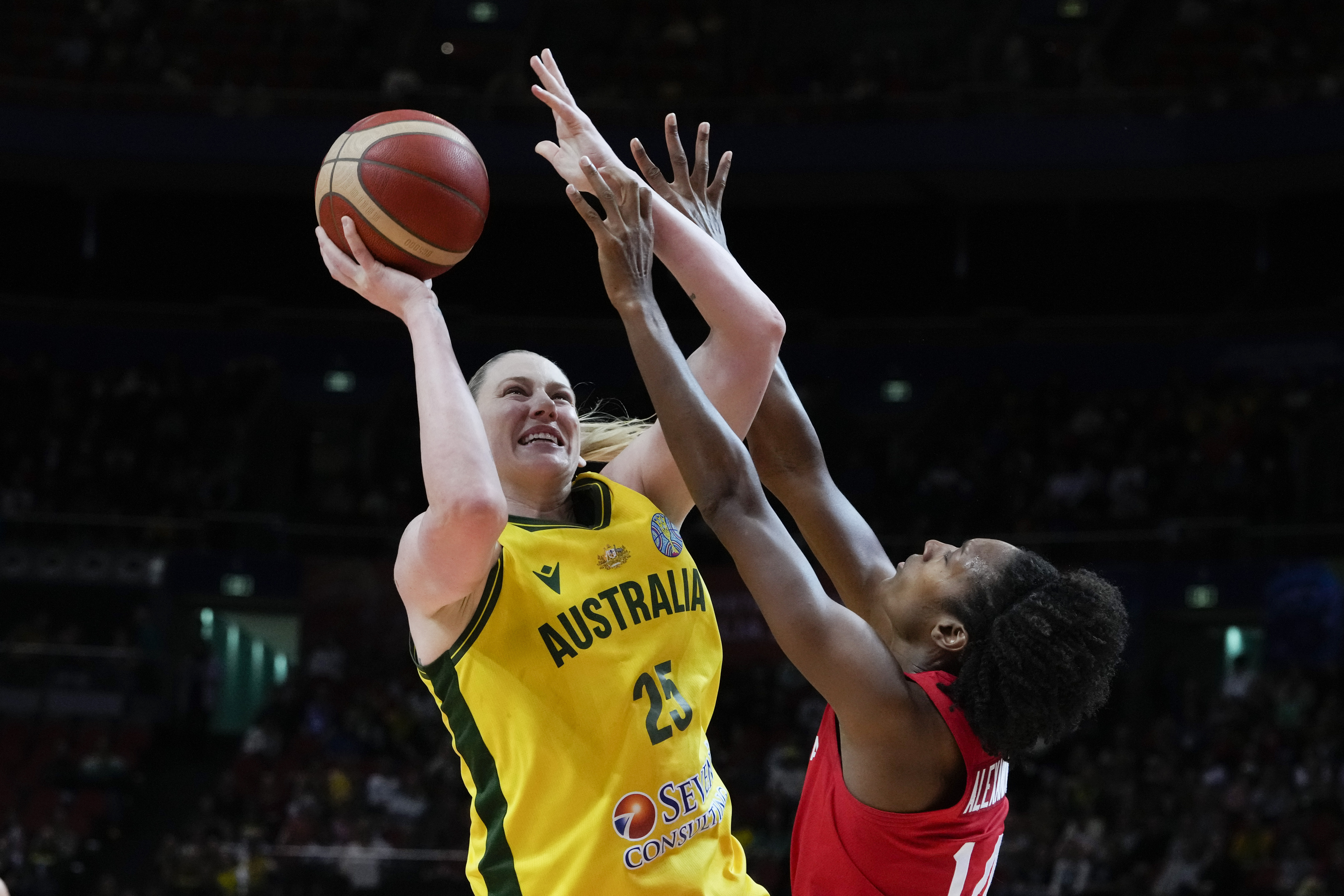Canada's Kayla Alexander, right, attempts to block a shot by Australia's Lauren Jackson during their bronze medal game at the women's Basketball World Cup in Sydney, Australia, Saturday, Oct. 1, 2022.