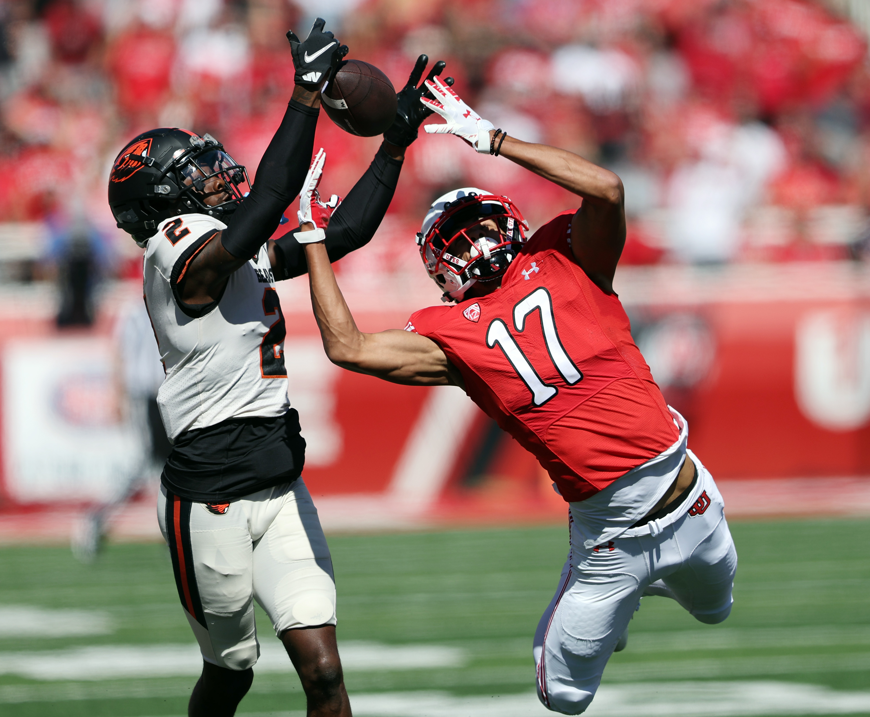 Oregon State Beavers defensive back Rejzohn Wright (2) and Utah Utes wide receiver Devaughn Vele (17) battle for the ball down the sideline as Utah and Oregon State play at Rice Eccles Stadium in Salt Lake City on Saturday, Oct. 1, 2022. The pass was incomplete.