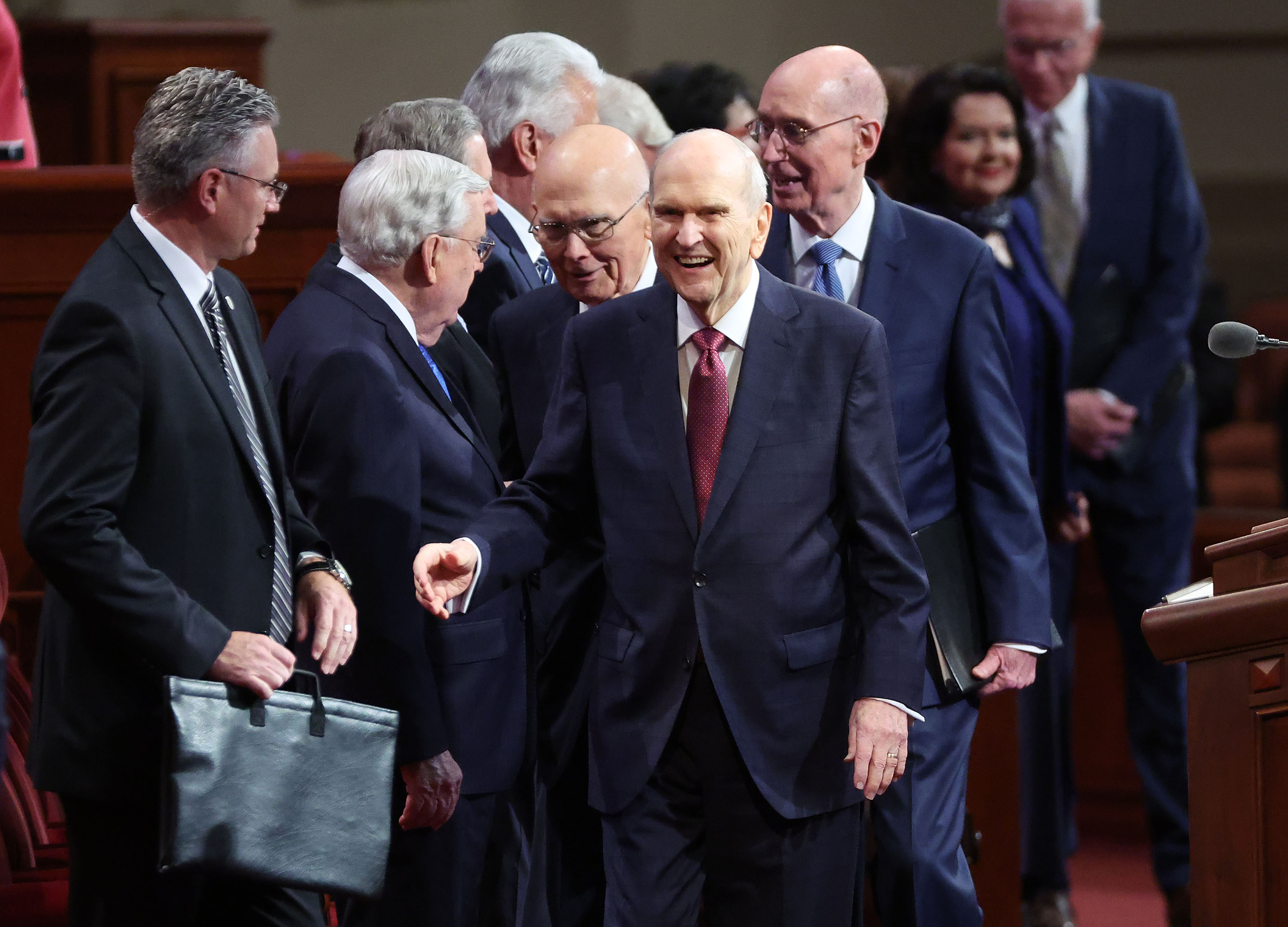 President Russell M. Nelson, of The Church of Jesus Christ of Latter-day Saints, smiles upon entering the Saturday afternoon session of the 192nd Semiannual General Conference of The Church of Jesus Christ of Latter-day Saints in Salt Lake City on Saturday.
