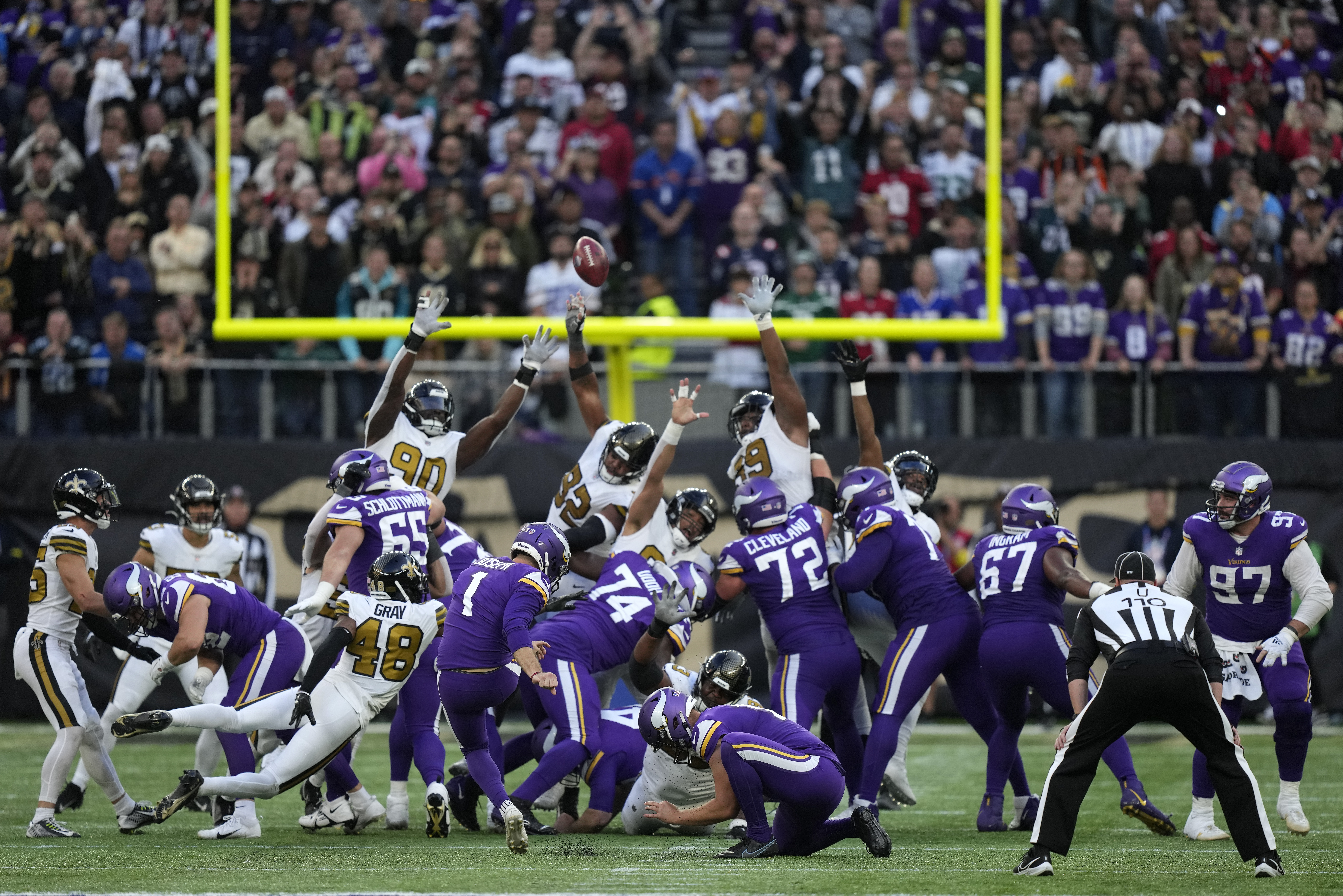 Minnesota Vikings place kicker Greg Joseph (1) kicks a field goal in the fourth quarter of an NFL match between Minnesota Vikings and New Orleans Saints at the Tottenham Hotspur stadium in London, Sunday, Oct. 2, 2022. 