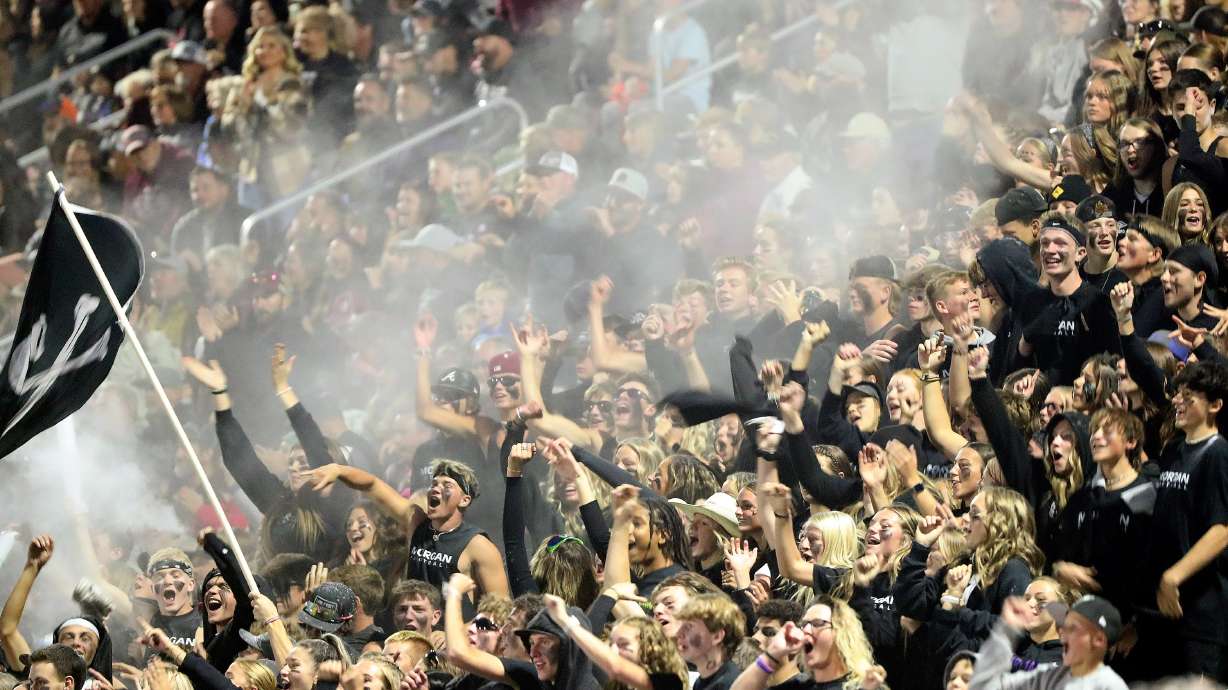 Morgan fans cheer as Morgan plays Grantsville in a varsity football game at Morgan High School in Morgan on Friday, Sept. 30, 2022.