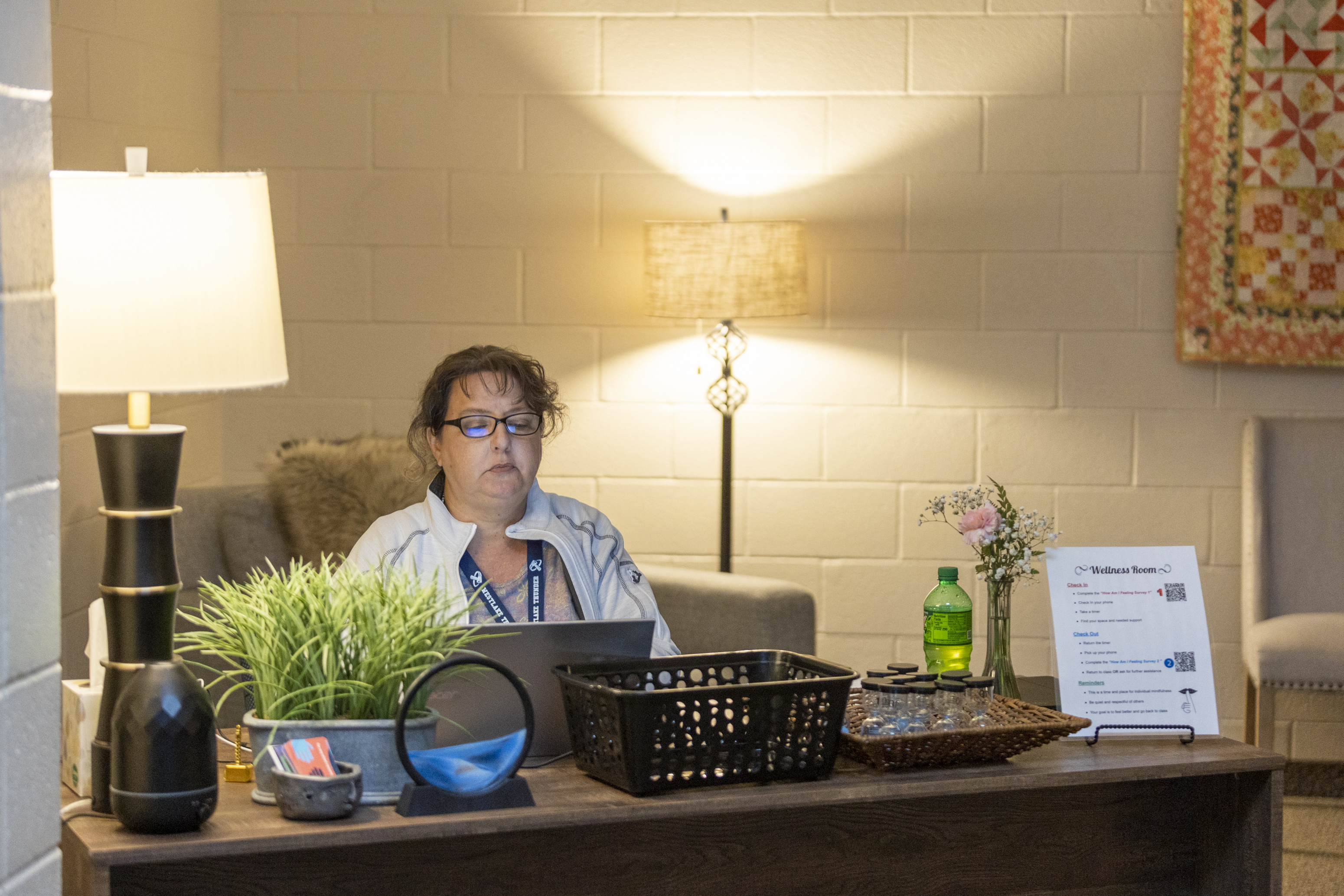 Kelly Schaub, wellness center coordinator at Westlake High School, works on her computer in Saratoga Springs on Thursday.