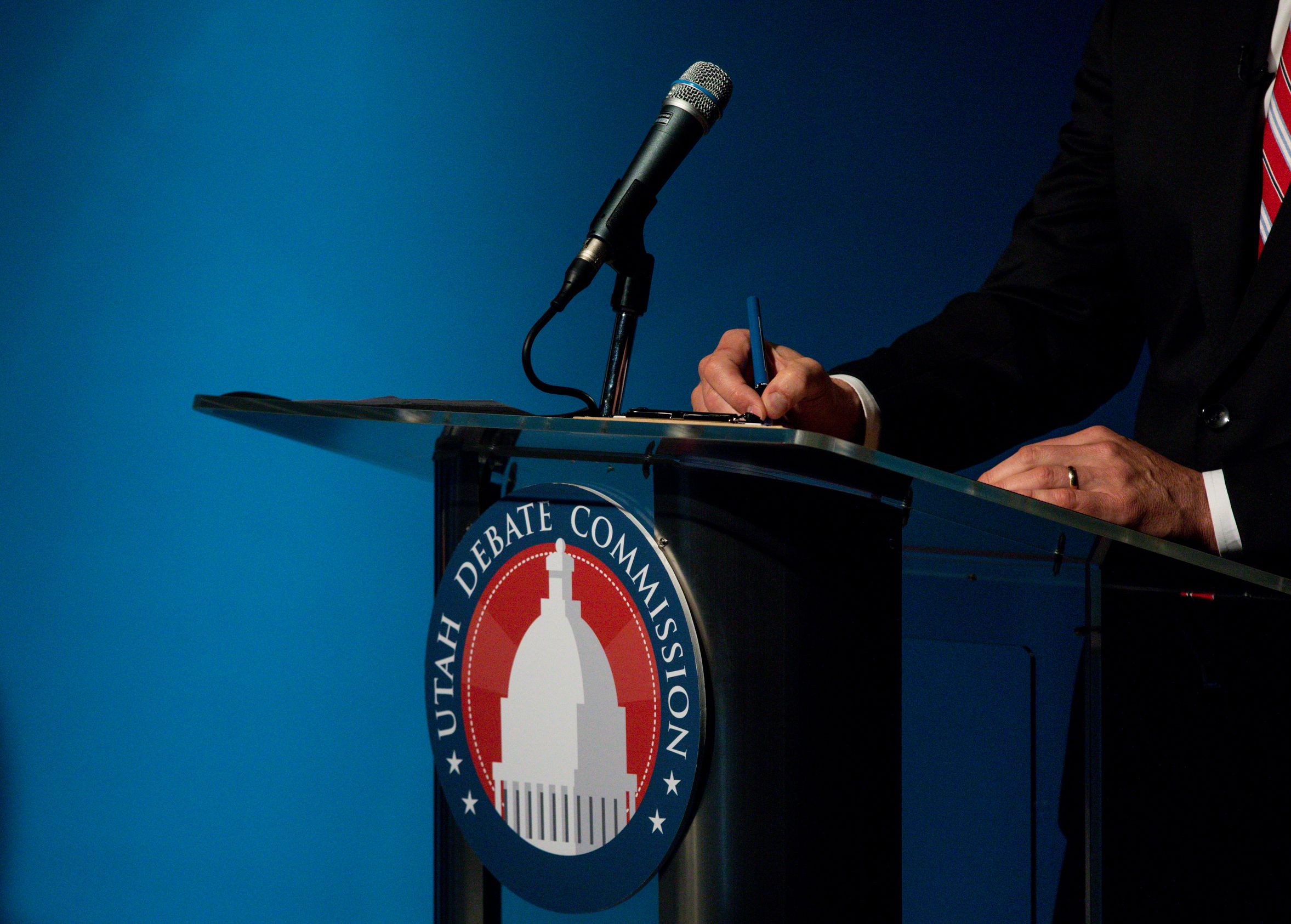 Former Utah GOP Chairman Thomas Wright takes notes during a Utah gubernatorial Republican primary debate in Salt Lake City on June 1, 2020. Most Republican incumbents refused to participate in Utah Debate Commission debates before the GOP primary, but all five will take part in the independent commission’s events starting this week ahead of the November midterm election.
