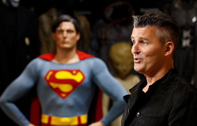 Propstore CEO Stephen Lane stands with Superman's (Christopher Reeve) complete costume from "Superman" franchise movies during an interview with Reuters at a Propstore facility in Rickmansworth, Britain, Sept. 27.