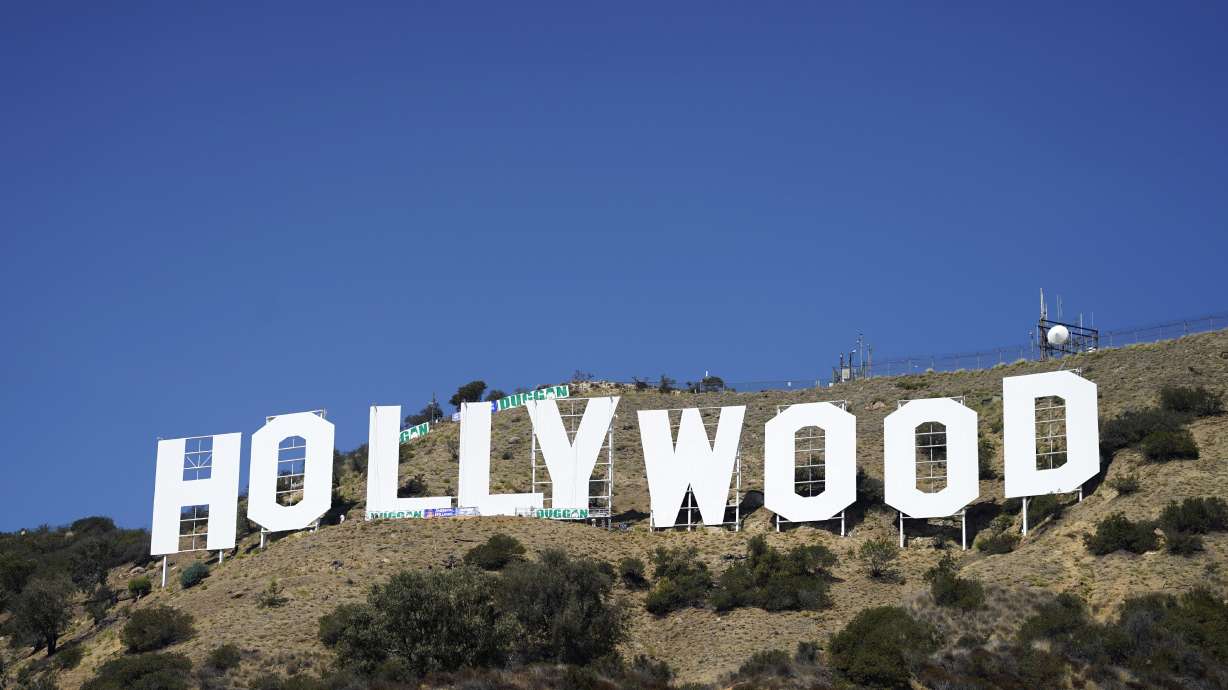 The Hollywood sign is pictured on Sept. 29 in Los Angeles. The Hollywood sign is getting a makeover befitting its status as a Tinseltown icon. After a pressure-wash and some rust removal, workers this week began using 250 gallons of primer and white paint to spruce up the sign ahead of its centennial next year.