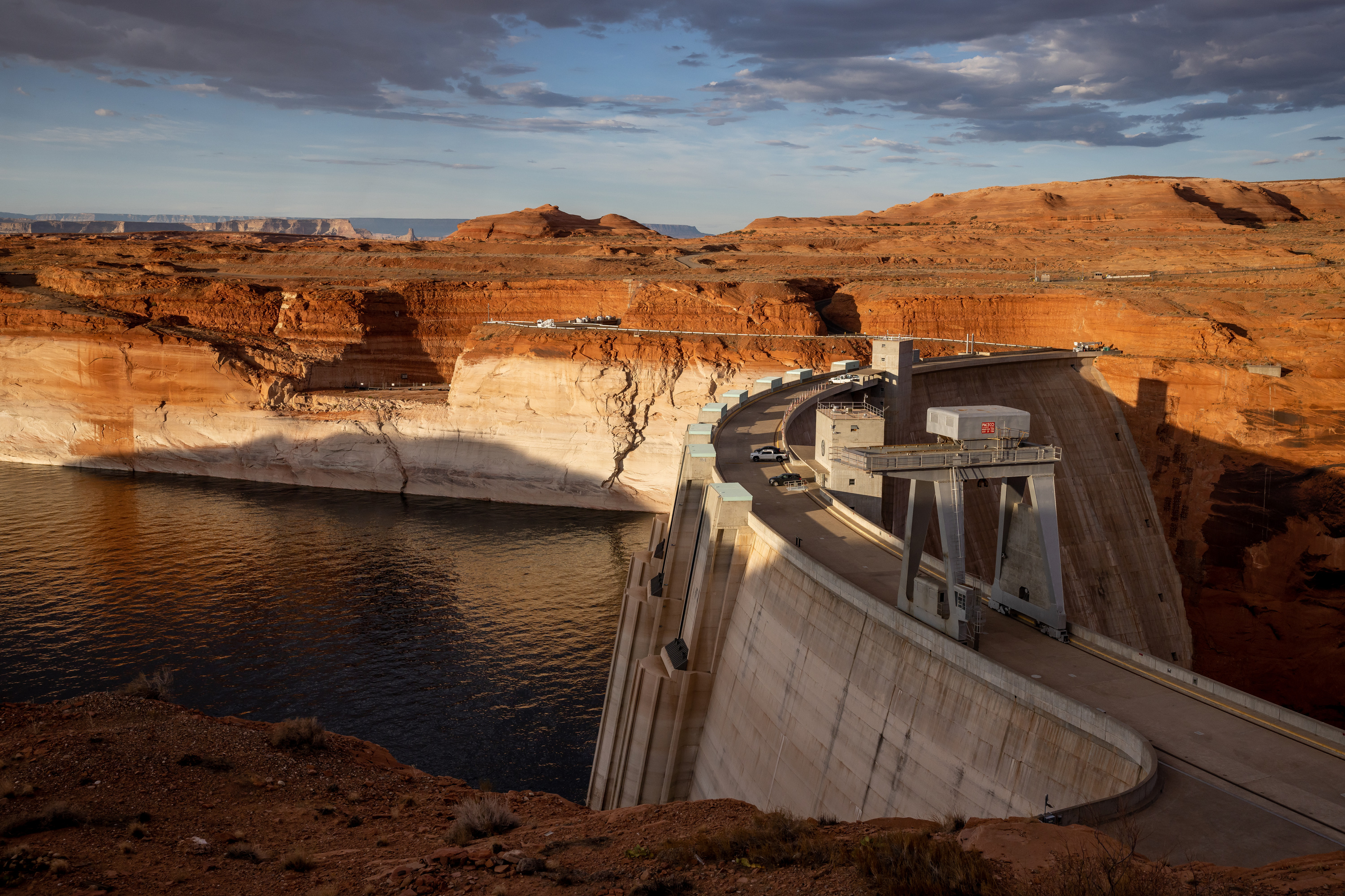 The Glen Canyon Dam holds back the waters of Lake Powell in Page, Arizona, on July 18, 2022. Lake Powell is expected to receive a decent bump in the coming months, but experts say it still has a "long way to go" after years of drought.