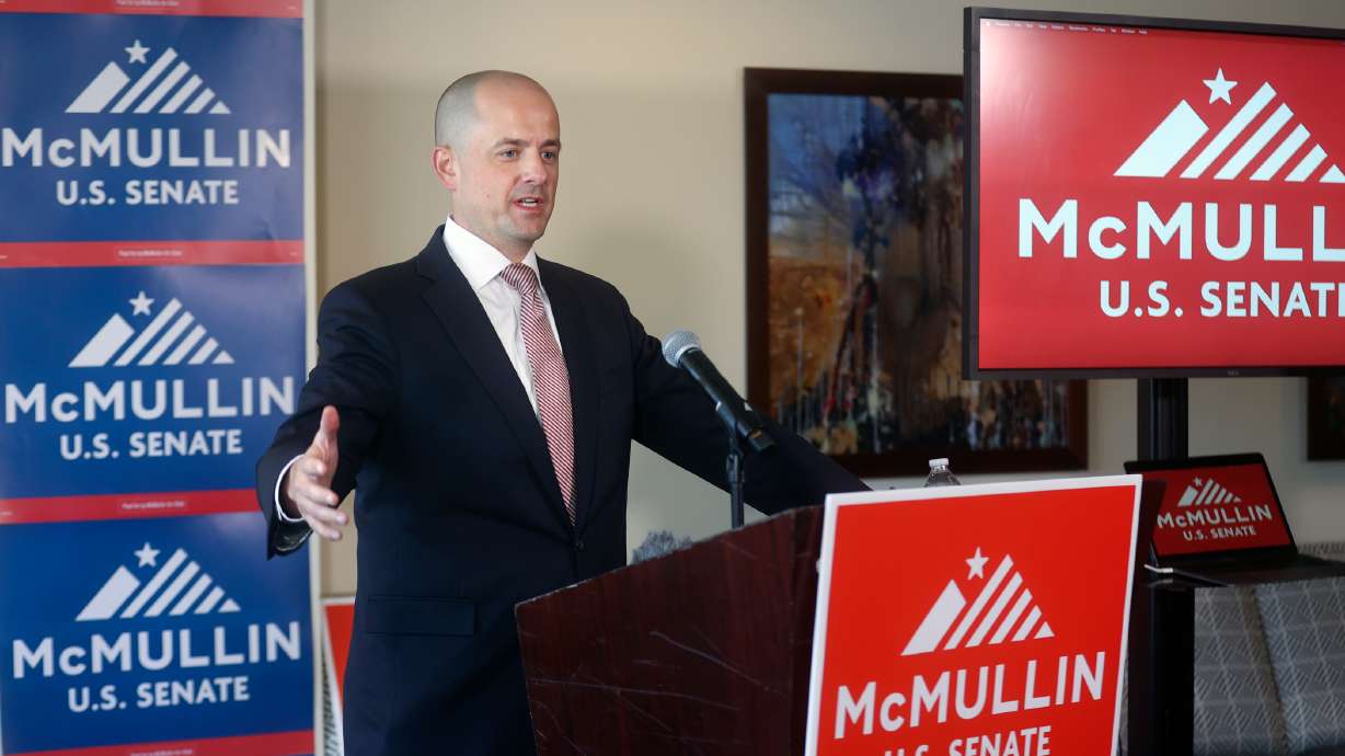 Independent U.S. Senate candidate Evan McMullin talks to members of the media about special interest groups running misleading ad campaigns against him at the Hilton Salt Lake City Center in Salt Lake City on Sept. 29. McMullin sued Club for Growth Action and local TV stations on Tuesday over a misleading attack ad, arguing the "doctored" video makes it sound like he called all Republicans racists and bigots.