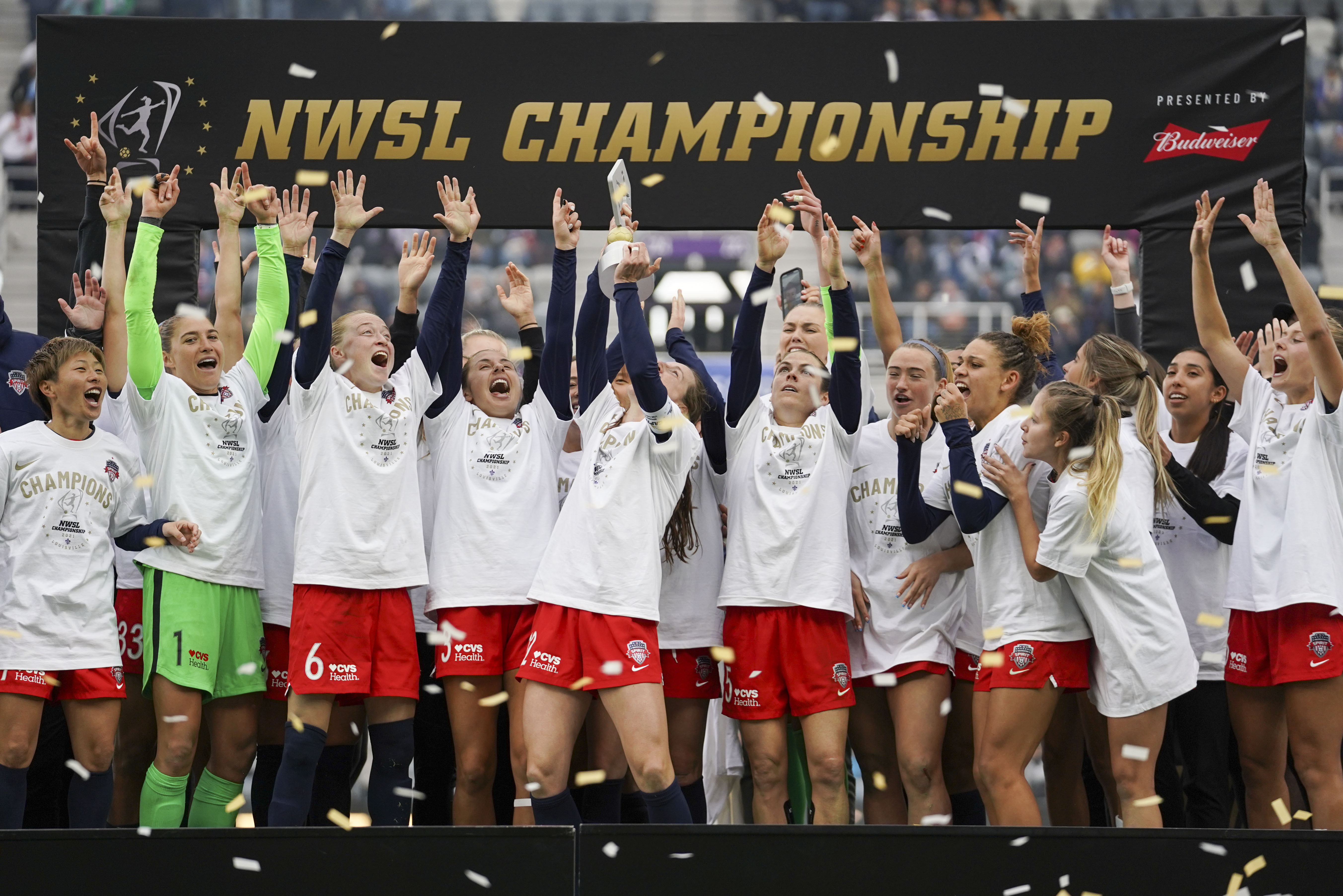 FILE - Washington Spirit players celebrate after defeating Chicago Red Stars in the NWSL Championship soccer match Saturday, Nov. 20, 2021, in Louisville, Kentucky. An independent investigation into the scandals that erupted in the National Women's Soccer League last season found emotional abuse and sexual misconduct were systemic in the sport, impacting multiple teams, coaches and players, according to a report released Monday, Oct. 3, 2022. 