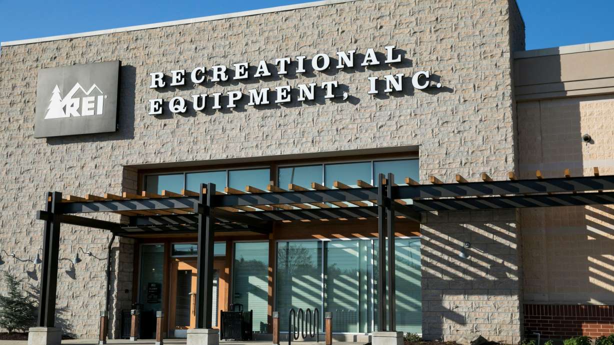 A logo sign outside of a Recreational Equipment, Inc. retail store location in Columbia, Md., in April 2020.