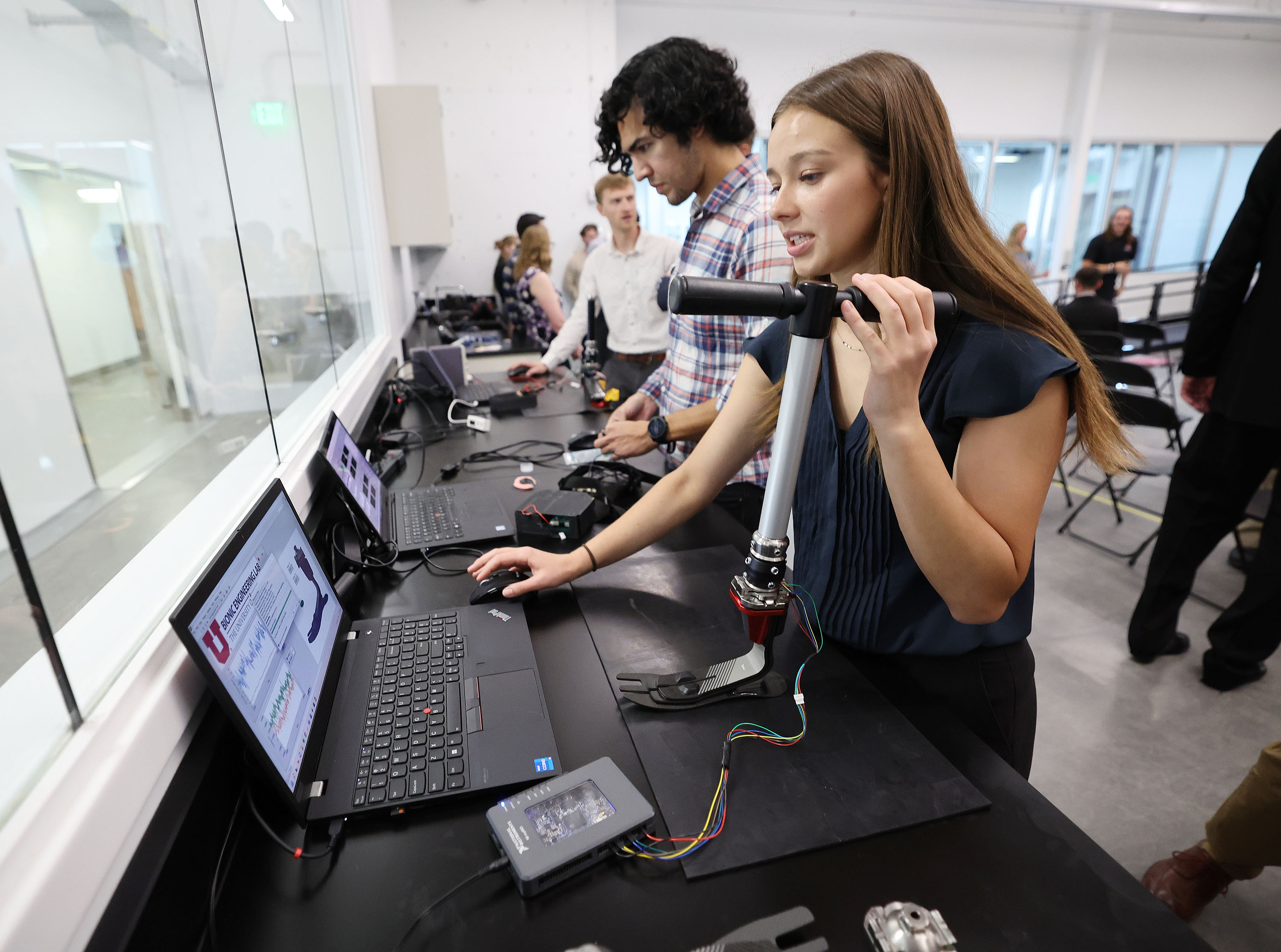 Doctoral student Marissa Cowan works on the Utah Bionic Leg at the new University of Utah College of Engineering HGN lab in Salt Lake City on Wednesday. The university has forged a new partnership with Ottobock, a leader in the prosthetics industry, to license the technology behind the Utah Bionic Leg and bring it to individuals with lower-limb amputations.