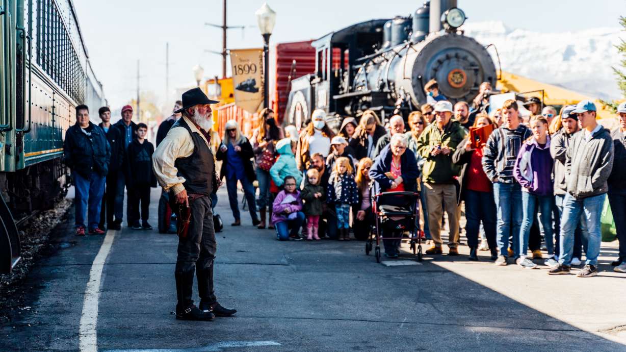 Passengers gather to ride the Heber Valley Railroad "Cowboy Express" at a previous Heber Valley Western Music and Cowboy Poetry Gathering. This year's festival features a lineup of singers, poets and other entertainers.