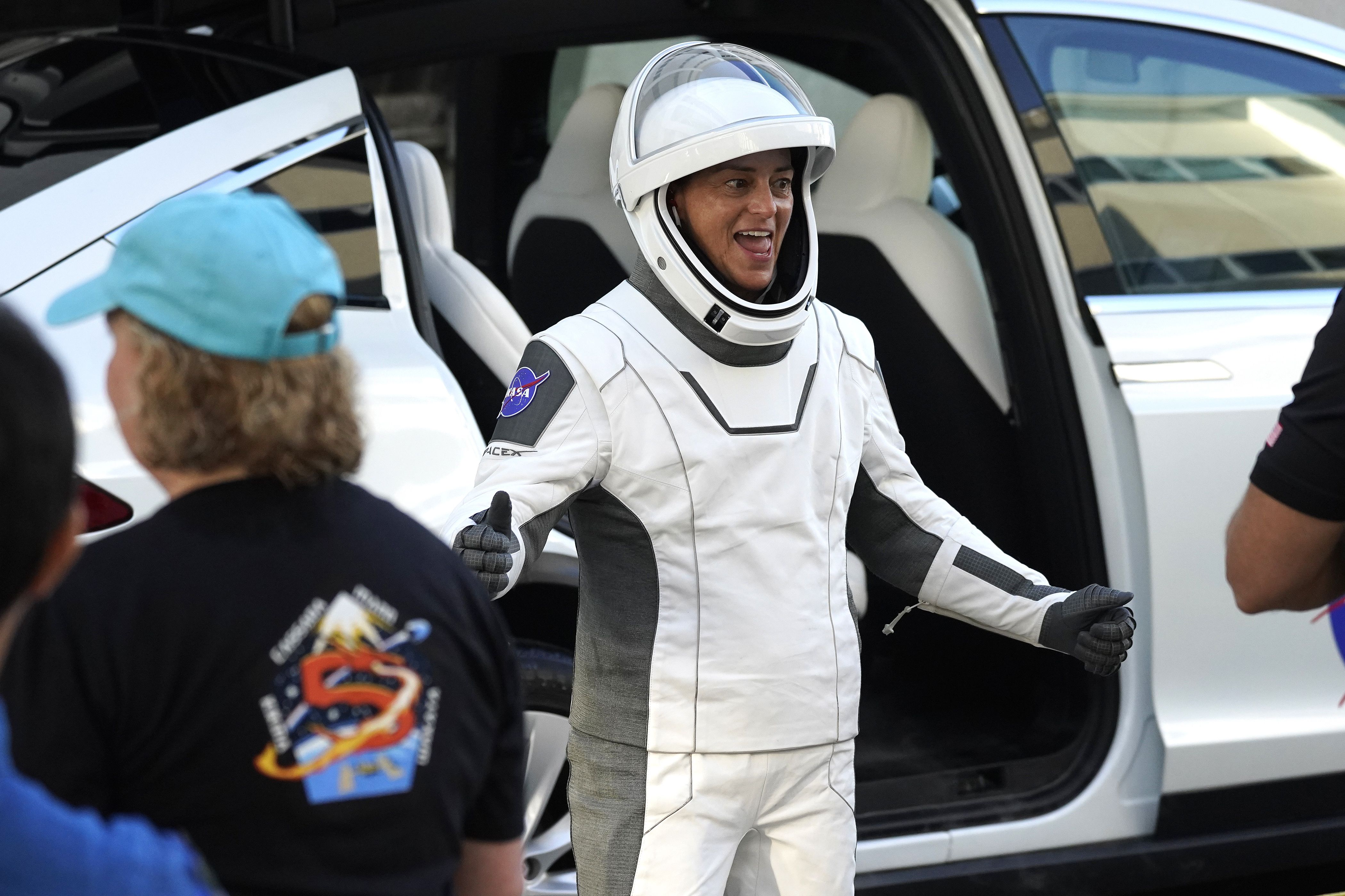 SpaceX Crew5 NASA astronaut Nicole Mann reacts as she leaves the Operations and Checkout building before heading to Launch Pad 39-A at the Kennedy Space Center in Cape Canaveral, Fla., for a mission to the International Space Station on Wednesday.