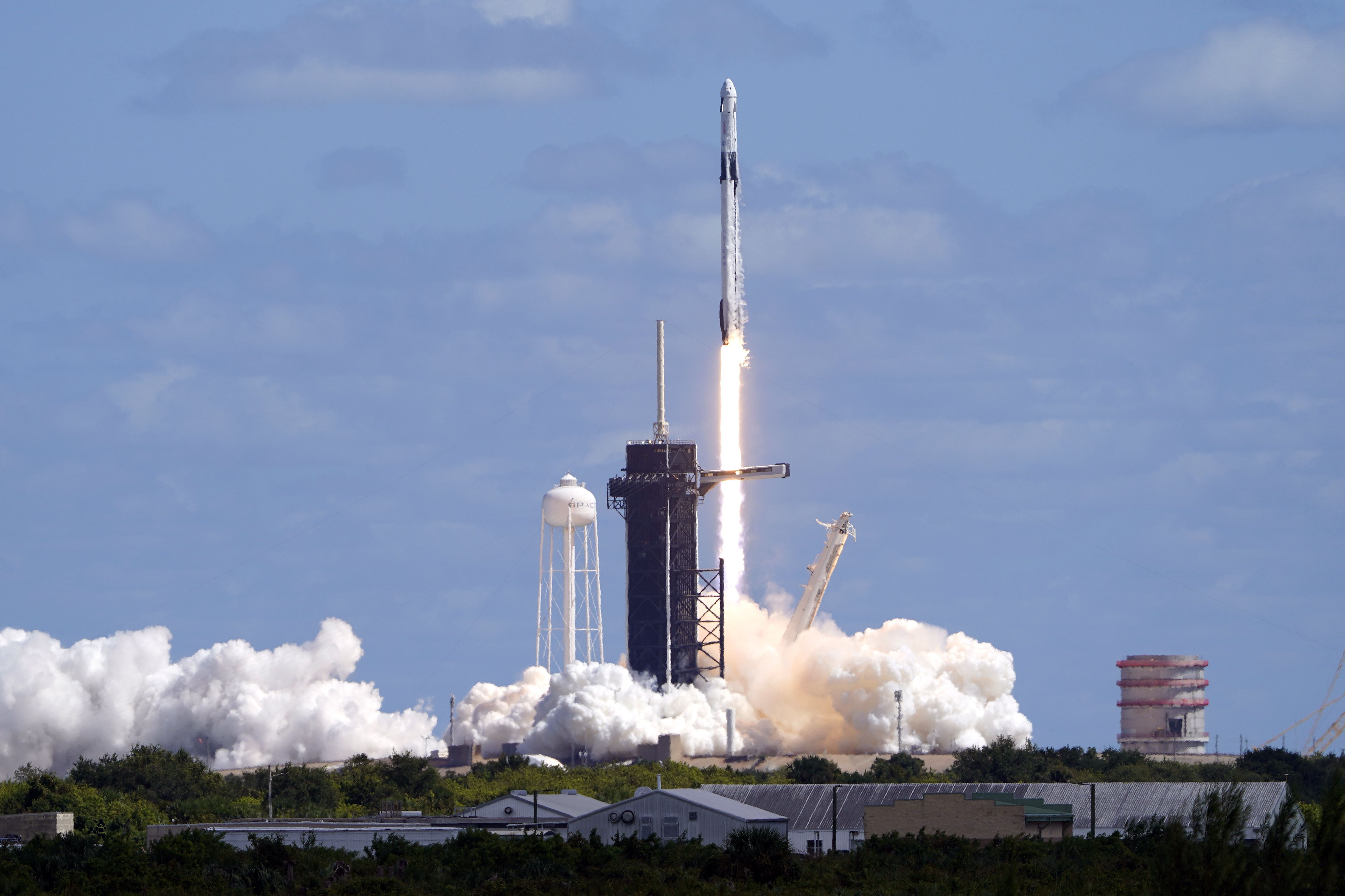 A SpaceX Falcon 9 rocket and the Dragon capsule, with a multinational crew of four astronauts, lifts off from Launch Complex 39-A on Wednesday at the Kennedy Space Center in Cape Canaveral, Fla., beginning a five-month mission to the International Space Station.