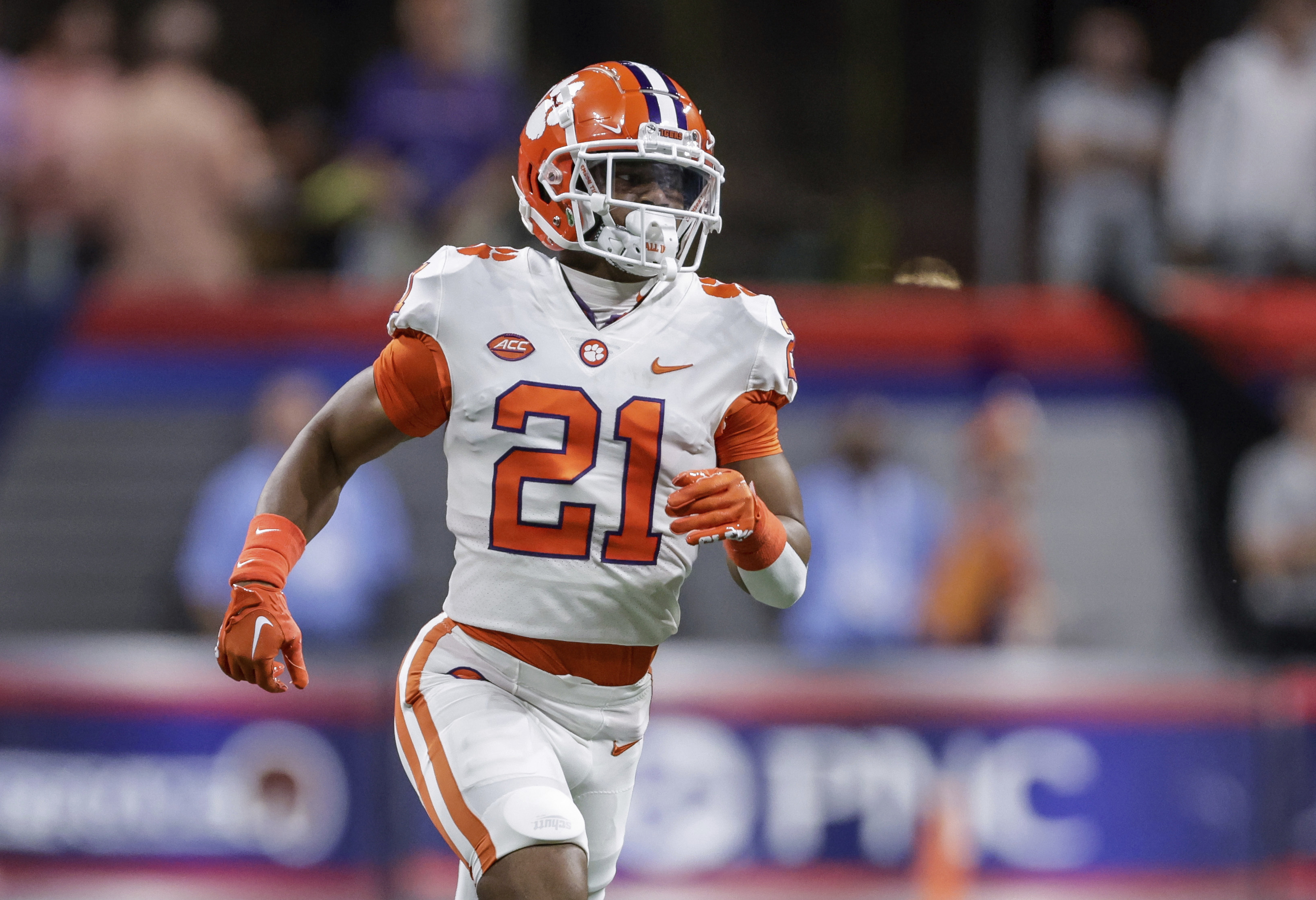 FILE - Clemson's Malcolm Greene runs on the field during the first half of the team's NCAA football game against Georgia Tech on Sept. 5, 2022, in Atlanta. Clemson defensive backs Greene and Fred Davis II are being sued by a U.S. postal worker whose car Davis collided with last year. The suit was filed Wednesday, Oct. 5, in Pickens County Common Pleas Court in South Carolina, a form of civil court. 