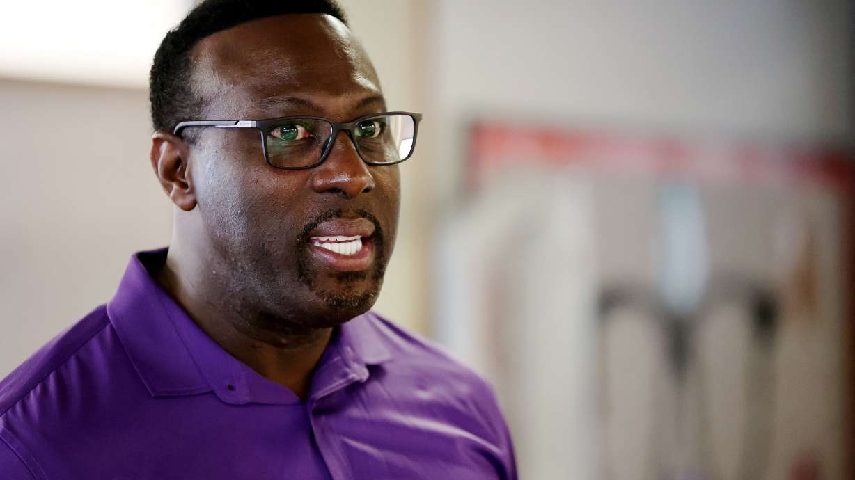 Timothy Gadson, then the incoming Salt Lake City School District superintendent, talks with other educators as he tours district facilities in Salt Lake City on June 29, 2021. Gadson has finalized the terms of his separation agreement with the district.