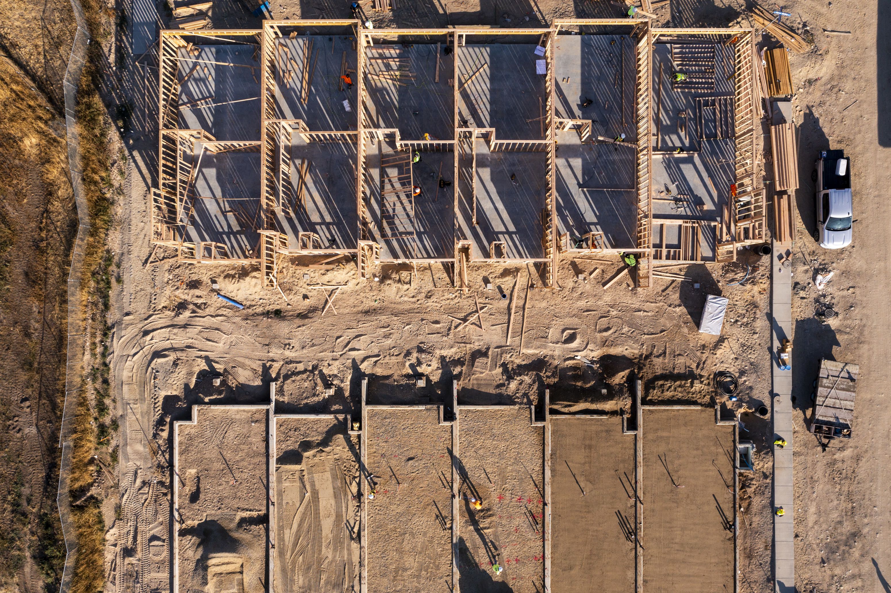 New homes are worked on in Meridian, Idaho, on Sept. 23. As the U.S. housing market has tipped into recession territory amid higher mortgage rates, some days hovering near 7%, there’s a new obsession with Boise.