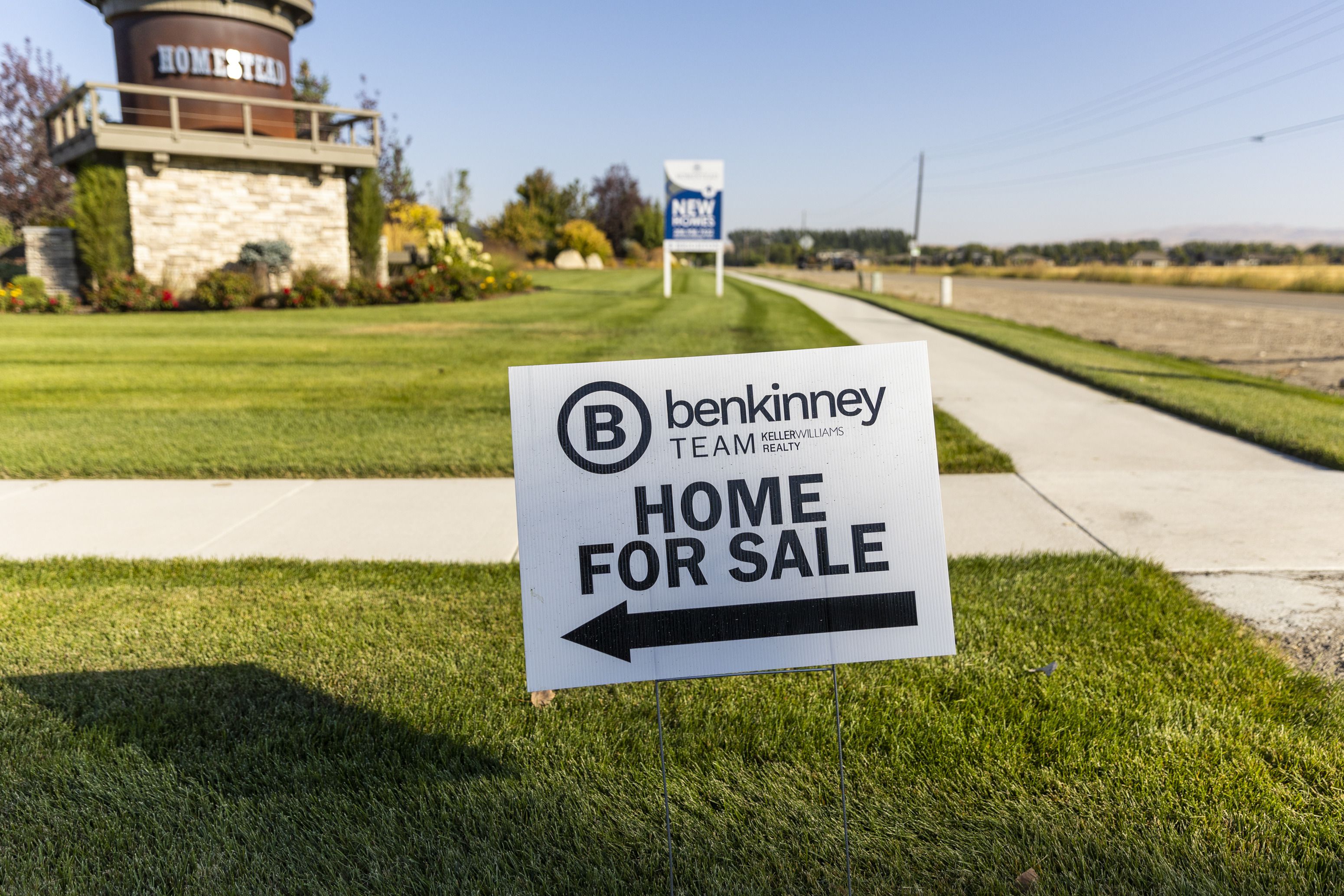 New homes are advertised for sale in Eagle, Idaho, on Sept. 23. As the U.S. housing market has tipped into recession territory amid higher mortgage rates, some days hovering near 7%, there’s a new obsession with Boise.