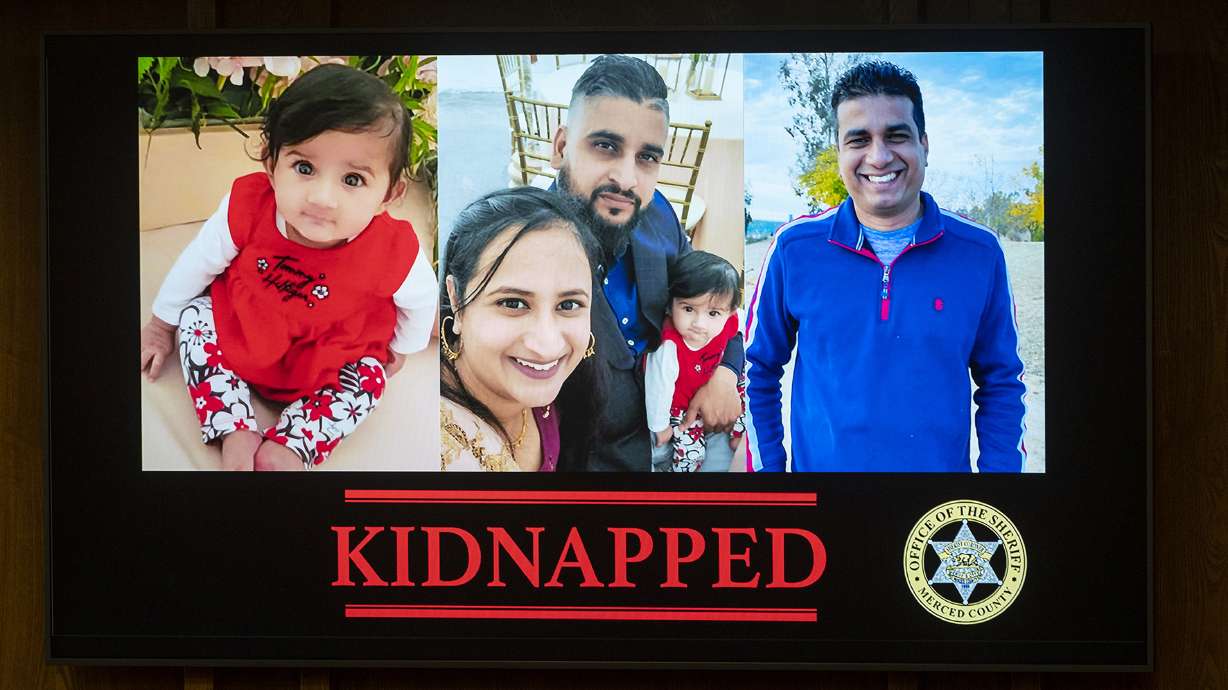 Images are displayed of 8-month-old Aroohi Dheri, left, with her mother Jasleen Kaur, her father Jasdeep Singh, and her uncle Amandeep Singh, at a news conference in Merced, Calif., on Wednesday. Sheriff Vern Warnke, of Merced County, announced Wednesday that the family members, who were kidnapped at gunpoint from their trucking business in central California, have been found dead.