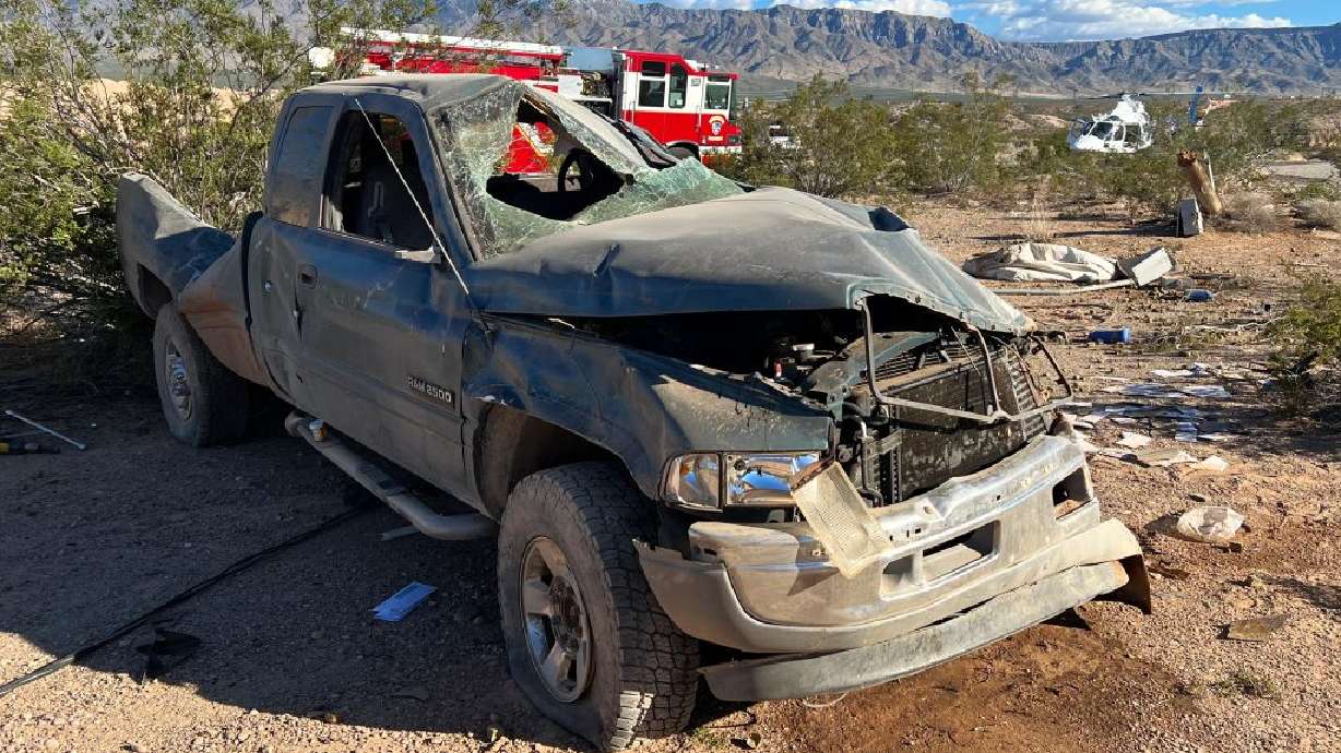 Dodge pickup truck is heavily damaged in rollover that critically injures driver in Littlefield, Ariz., Tuesday.