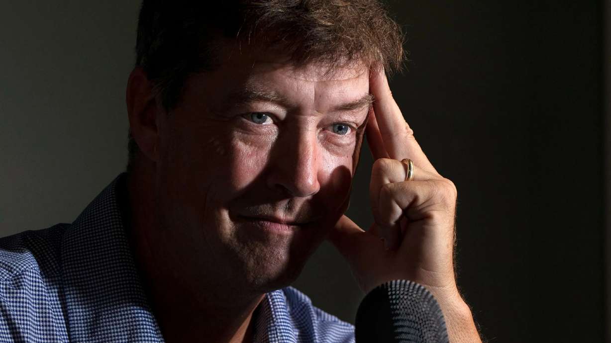 John Ziegler with his microphone in his home office in Camarillo, California, on Tuesday, Sept. 27.