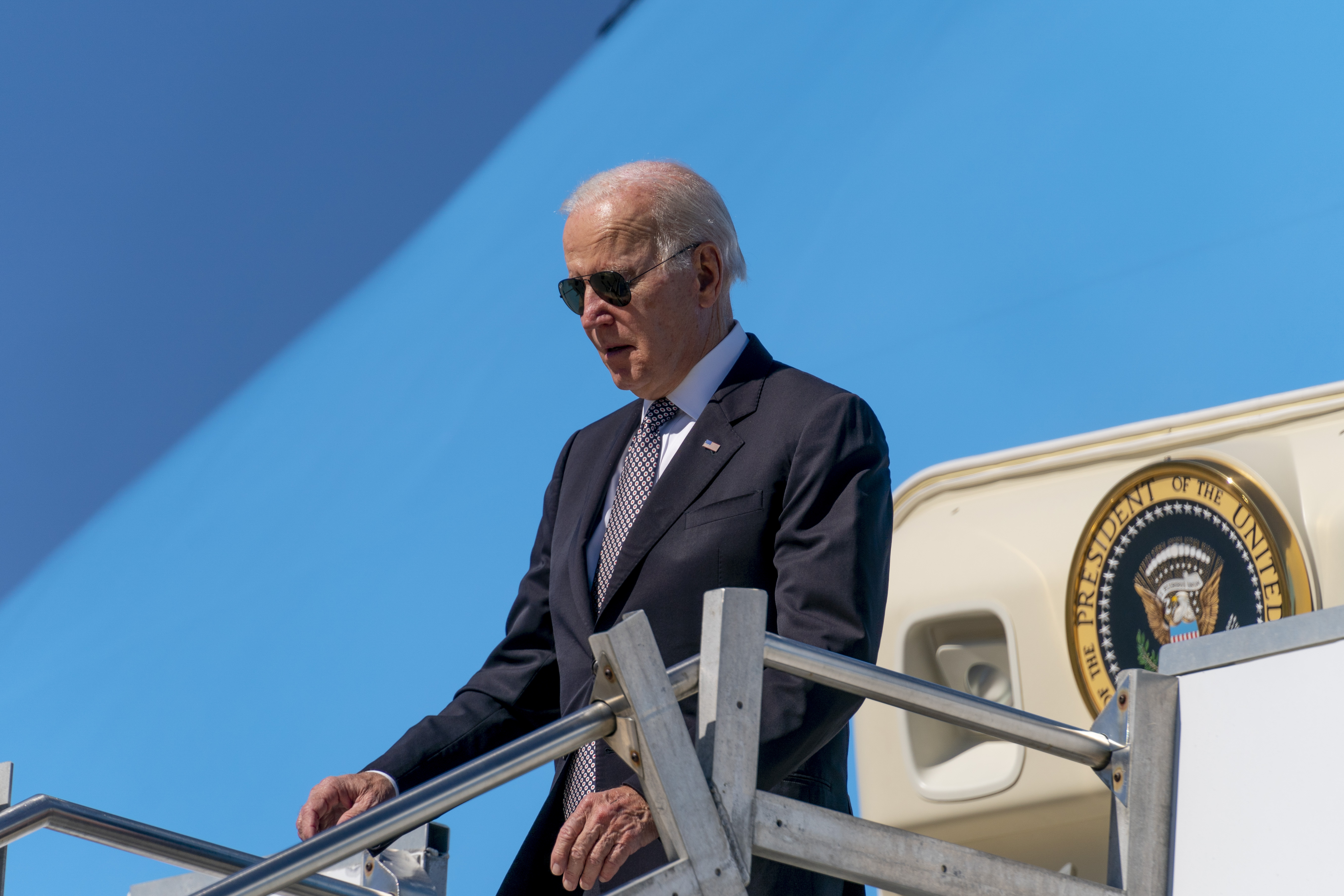President Joe Biden arrives at Stewart Air National Guard Base in Newburgh, N.Y., Thursday. Biden is pardoning thousands of Americans convicted of "simple possession" of marijuana, as his administration takes a dramatic step toward decriminalizing the drug and addressing charging practices that disproportionately impact people of color.