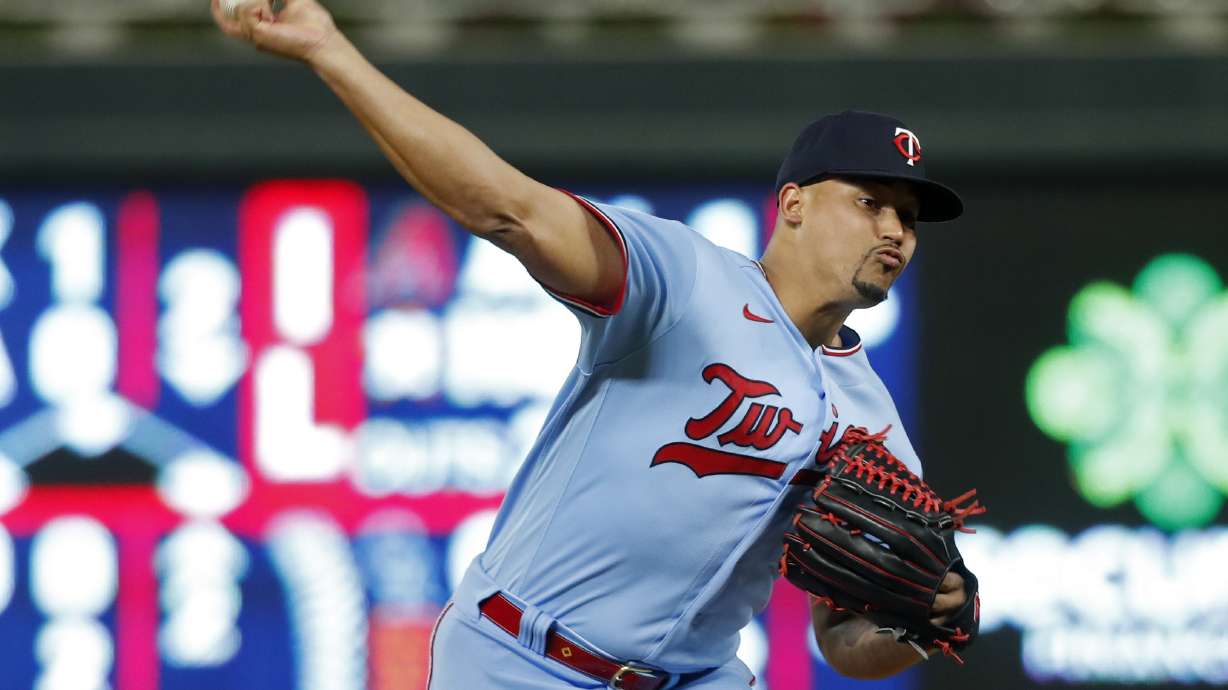 Minnesota Twins relief pitcher Jhoan Duran throws to the Chicago White Sox in the ninth inning of a baseball game Tuesday, Sept. 27, 2022, in Minneapolis. The Twins won 4-0.