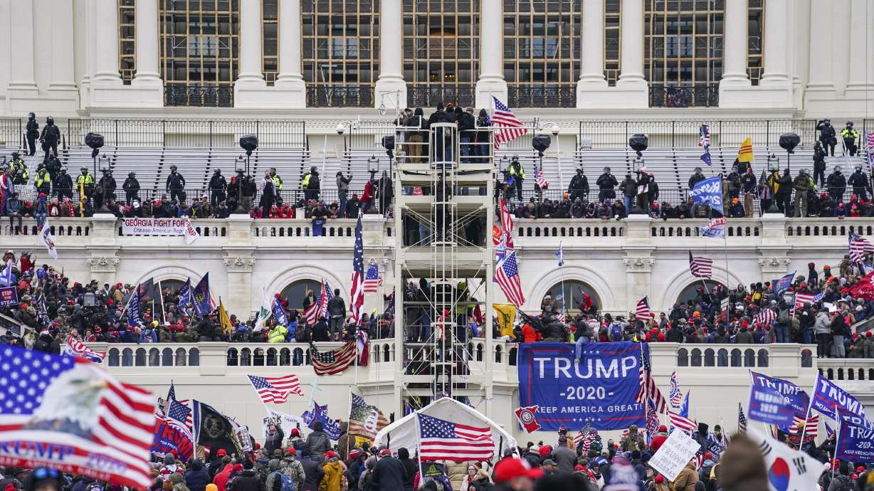 Insurrectionists loyal to President Donald Trump breach the Capitol in Washington, Jan. 6, 2021. A North Carolina man pleaded guilty on Thursday to plotting with other members of the far-right Proud Boys to violently stop the transfer of presidential power after the 2020 election.