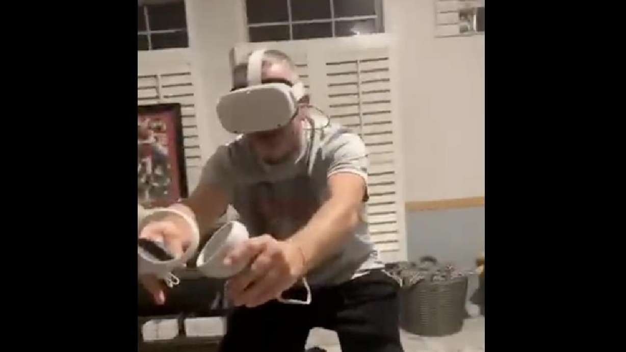 A man taking a snap playing VR football.